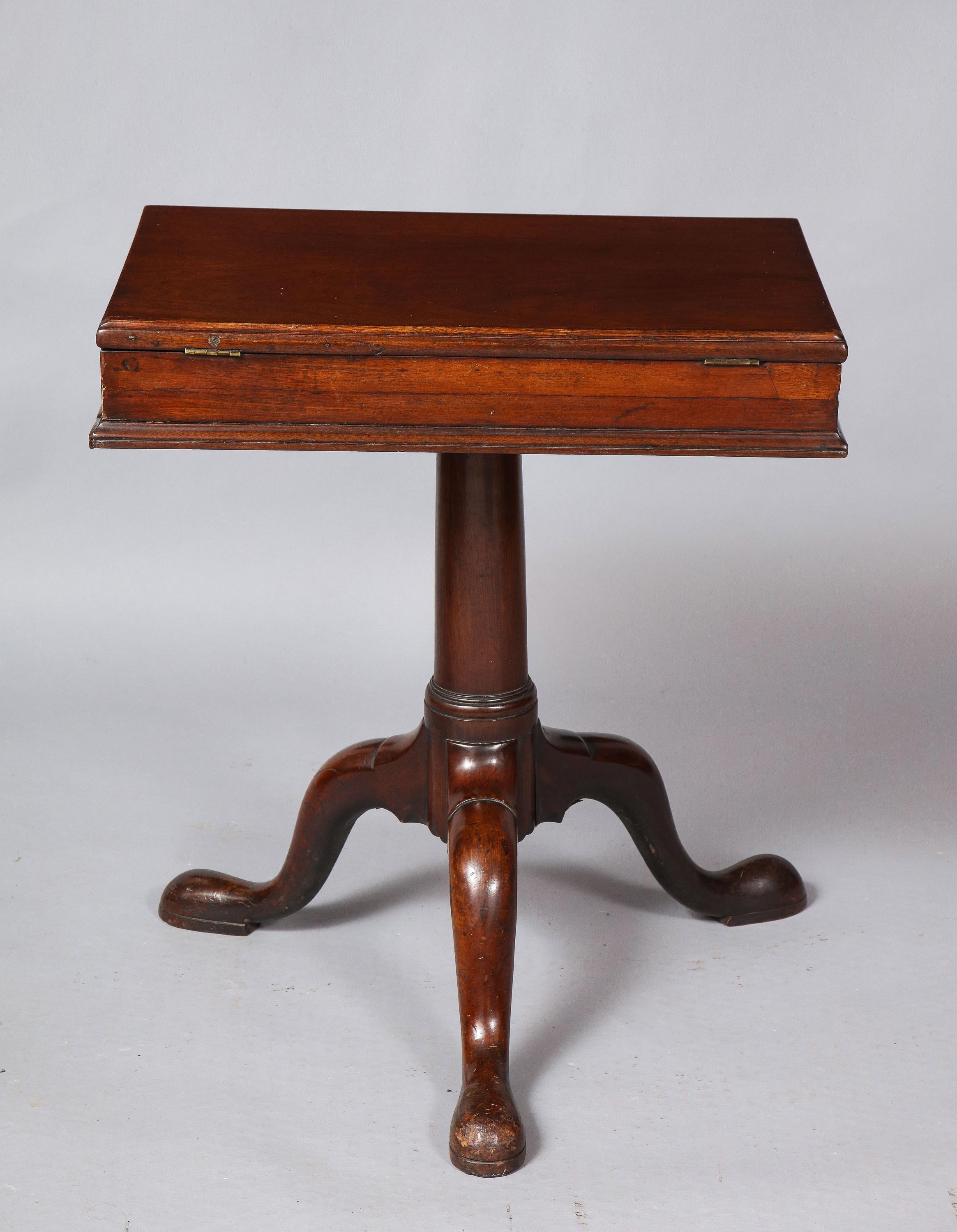 Wonderful and rare George II period solid mahogany library bookstand of excellent proportions having ratcheted adjustable top over two shallow drawers, standing on simple turned column shaft and standing on three cabriole legs ending in slipper