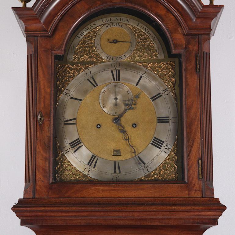 A very rare mahogany-cased grandfather clock by London maker Thomas Grignion, (1713-1784). The eight-day movement striking on the hour and with ‘silent / striking’ mechanism. Arched brass dial with separate silvered brass chapter ring, seconds ring