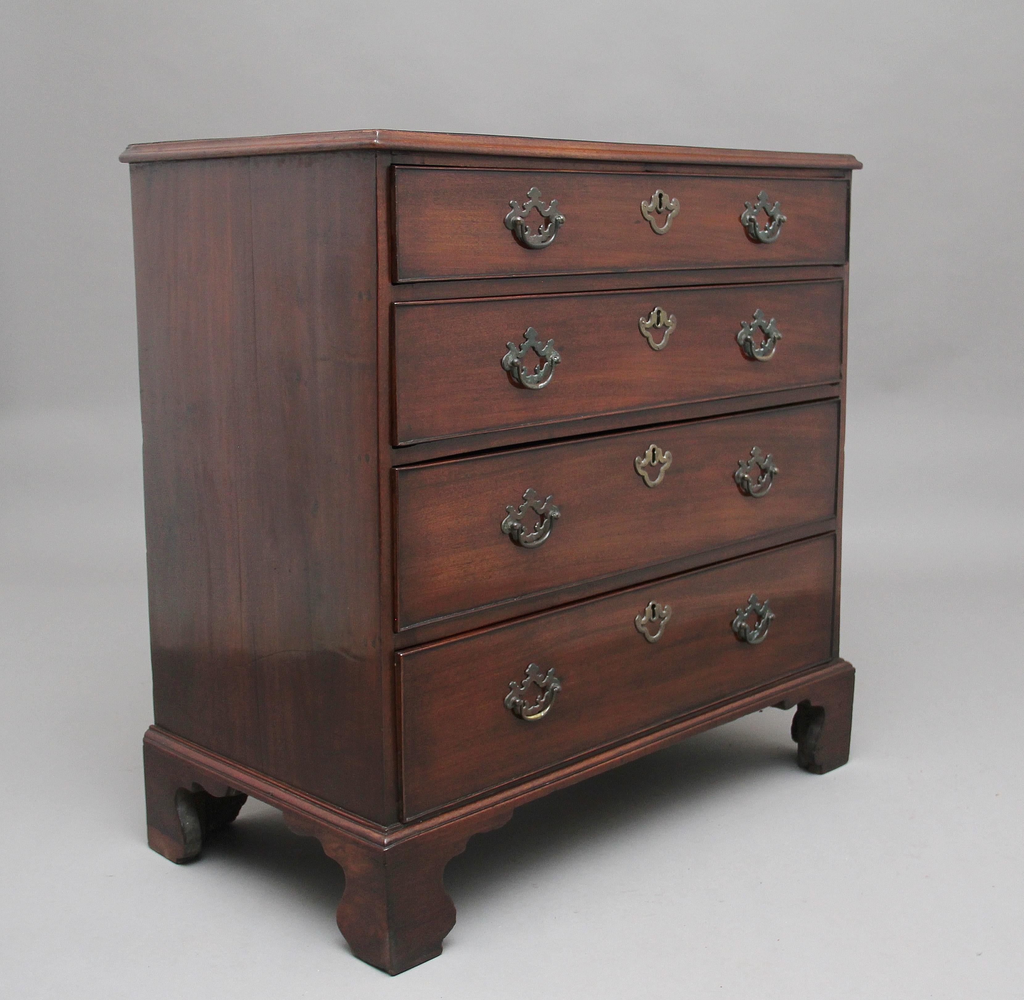 A lovely quality 18th century mahogany chest of drawers of good proportions, the moulded edge top above four long graduated oak lined drawers having brass plate handles and escutcheons, standing on shaped bracket feet. Lovely color and in excellent