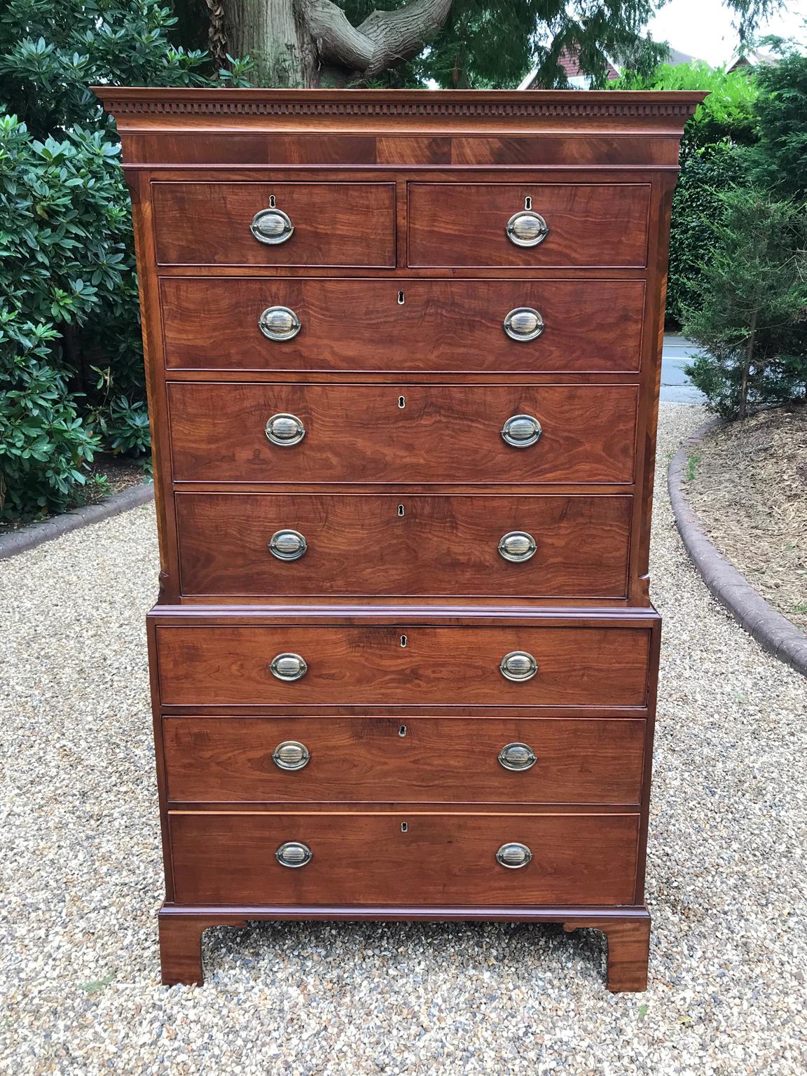 A very high quality 18th century mahogany chest on chest (Tallboy) two short drawers at the top and six long drawers. Original oval brass handles and solid oak lined drawers. Comes apart in two separate sections on original bracket feet,

circa