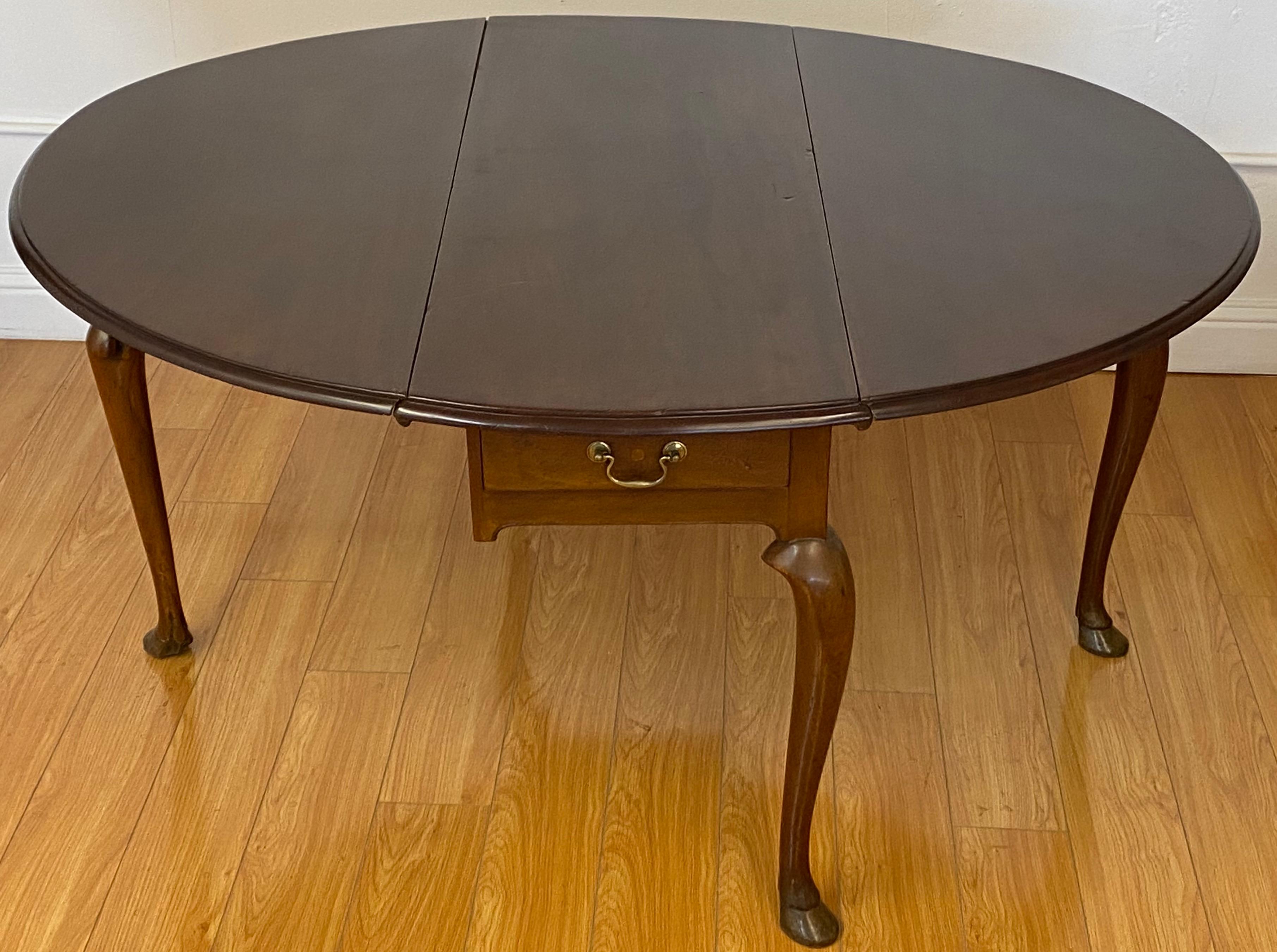 Hand-Carved 18th Century Mahogany Drop-Leaf Table with Hoof Feet For Sale