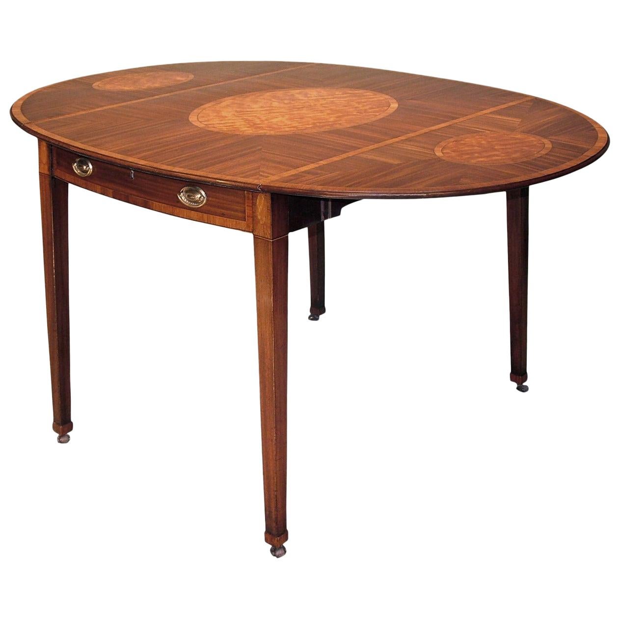 Table Pembroke ovale en acajou du XVIIIe siècle en vente