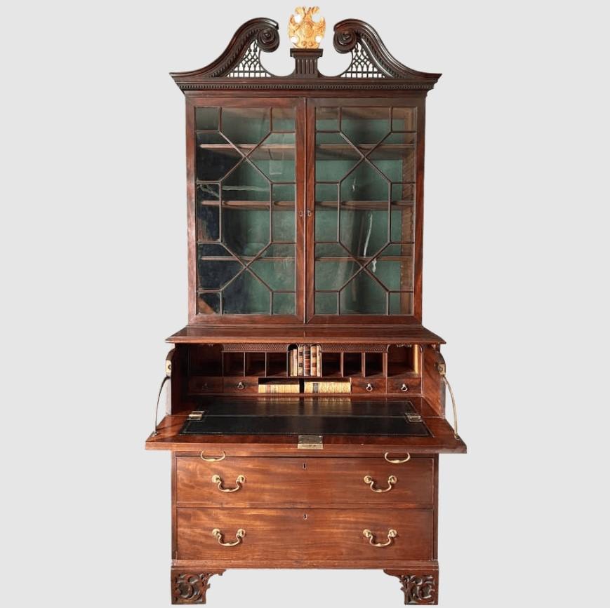 A fine English mid-18th century mahogany secretaire / secretary / bookcase / china cabinet. 
Of lovely, deep, rich color, patina and quality.
George III-period, circa 1760.

The bold, detachable, swan-neck pediment carved with 'Gothic' open