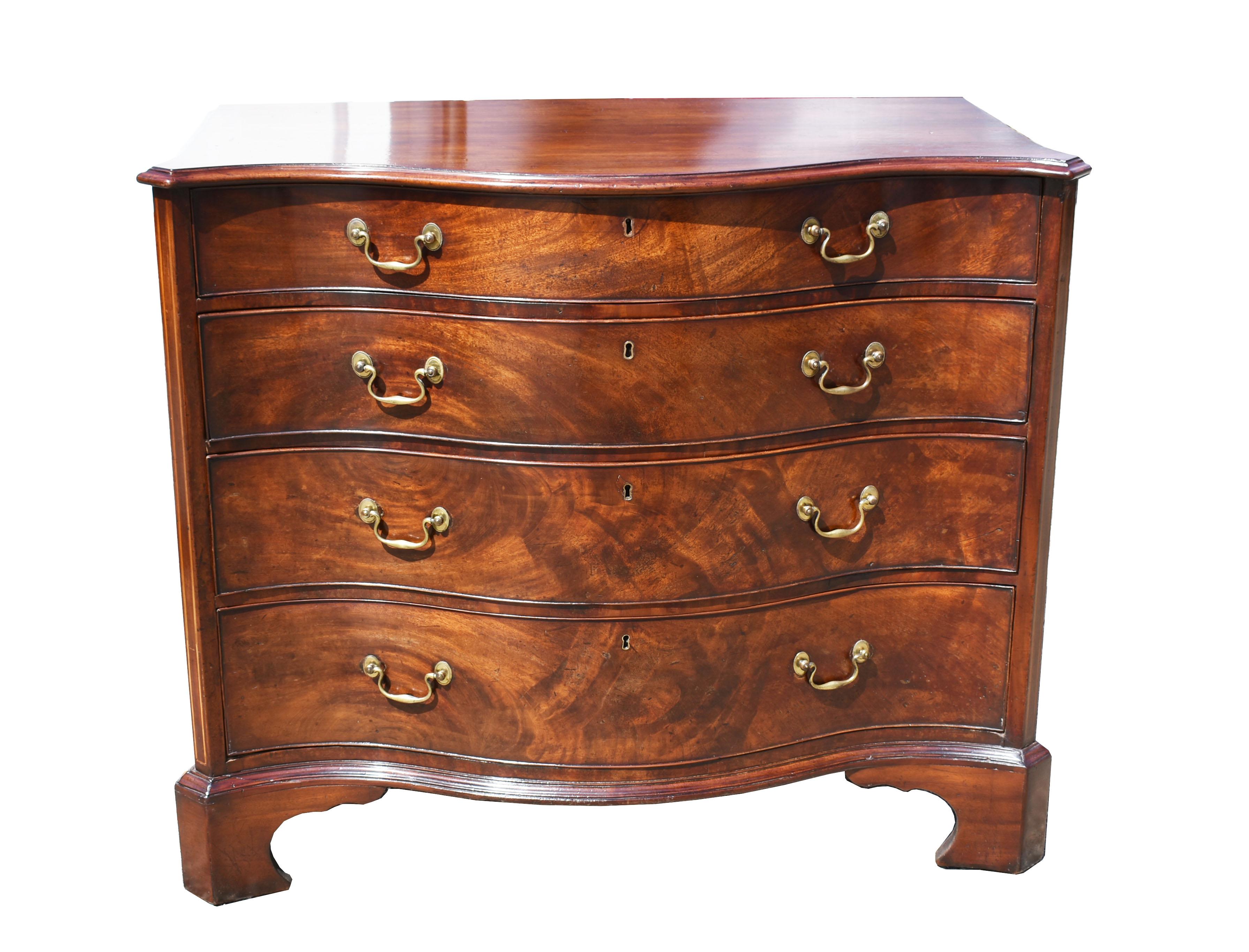 For sale is a top quality George III Mahogany serpentine chest of drawers. The chest has four graduated drawers each with brass swan neck handles. The chest stands on nicely shaped serpentine bracket feet. This piece is in excellent condition having