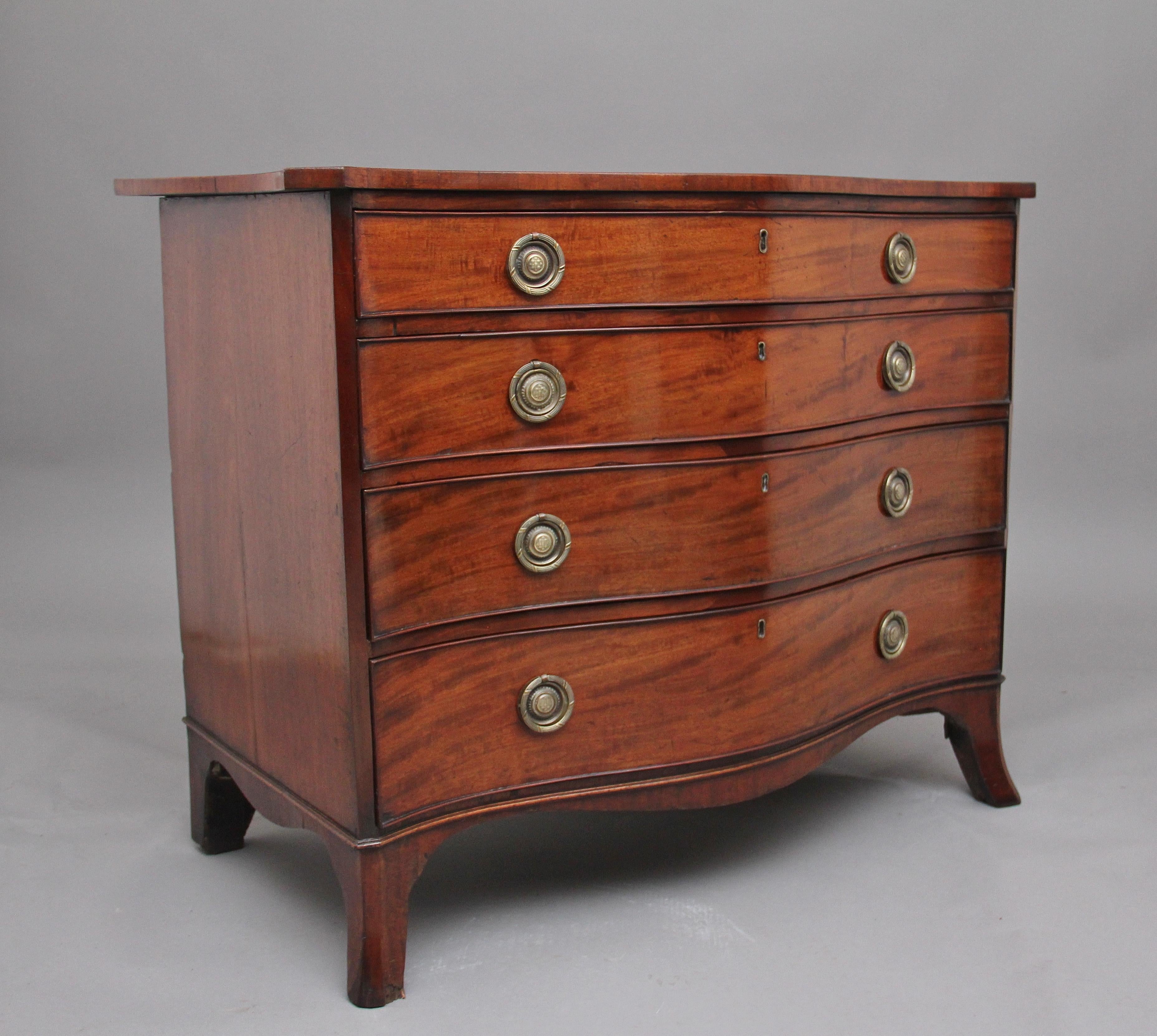 Superb quality 18th century mahogany serpentine chest of drawers, having a lovely figured and shaped top above four long oak lined drawers with engraved brass ring handles and escutcheons, shaped apron to the sides and front of the chest, standing