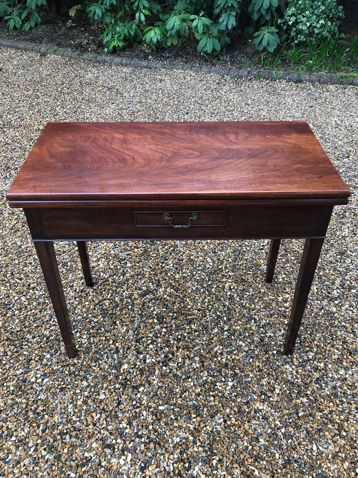 18th century mahogany fold-over tea table with a small single drawer,

circa 1790.

Dimensions:
Height 29 inches – 74 cms
Width 26.5 inches – 67 cms
Depth 17 inches – 43 cms.

 