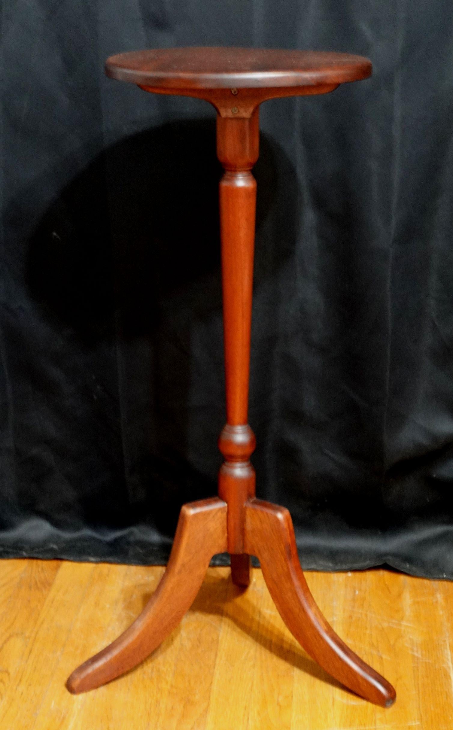 Very unusual solid and stable 18th century mahogany tripod candle stand.
Measures: 34 x 13 1/2 inches.