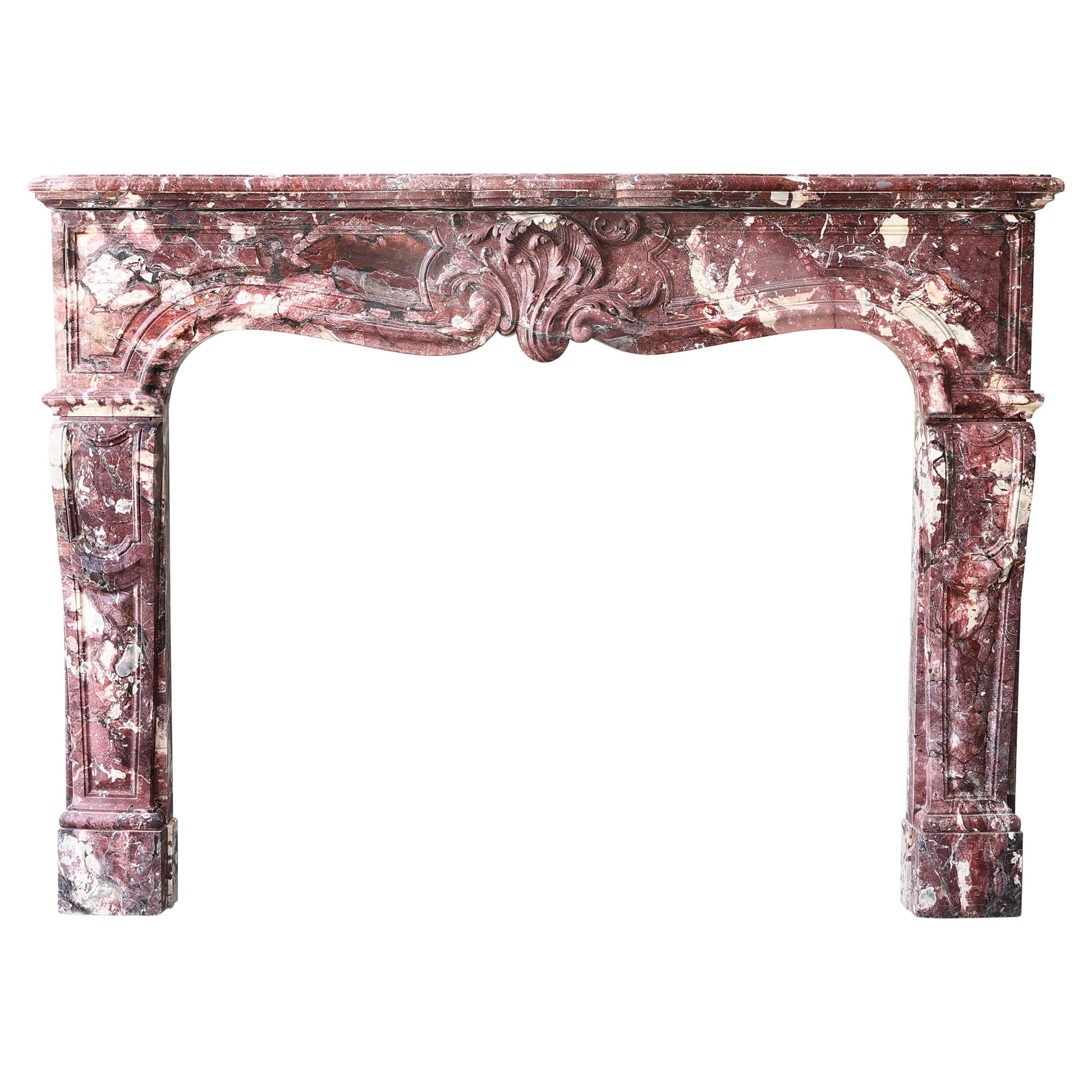 18th Century Antique Marble Fireplace in Fleur de Pecher. For Sale