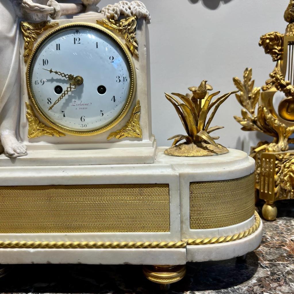 Gilt 18th-Century Marble Clock with a Woman from Classical Antiquity  For Sale