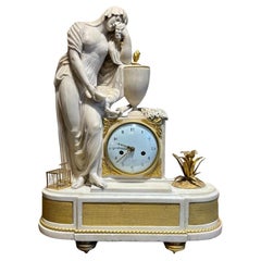 Reloj de mármol del siglo XVIII con una mujer de la Antigüedad clásica 
