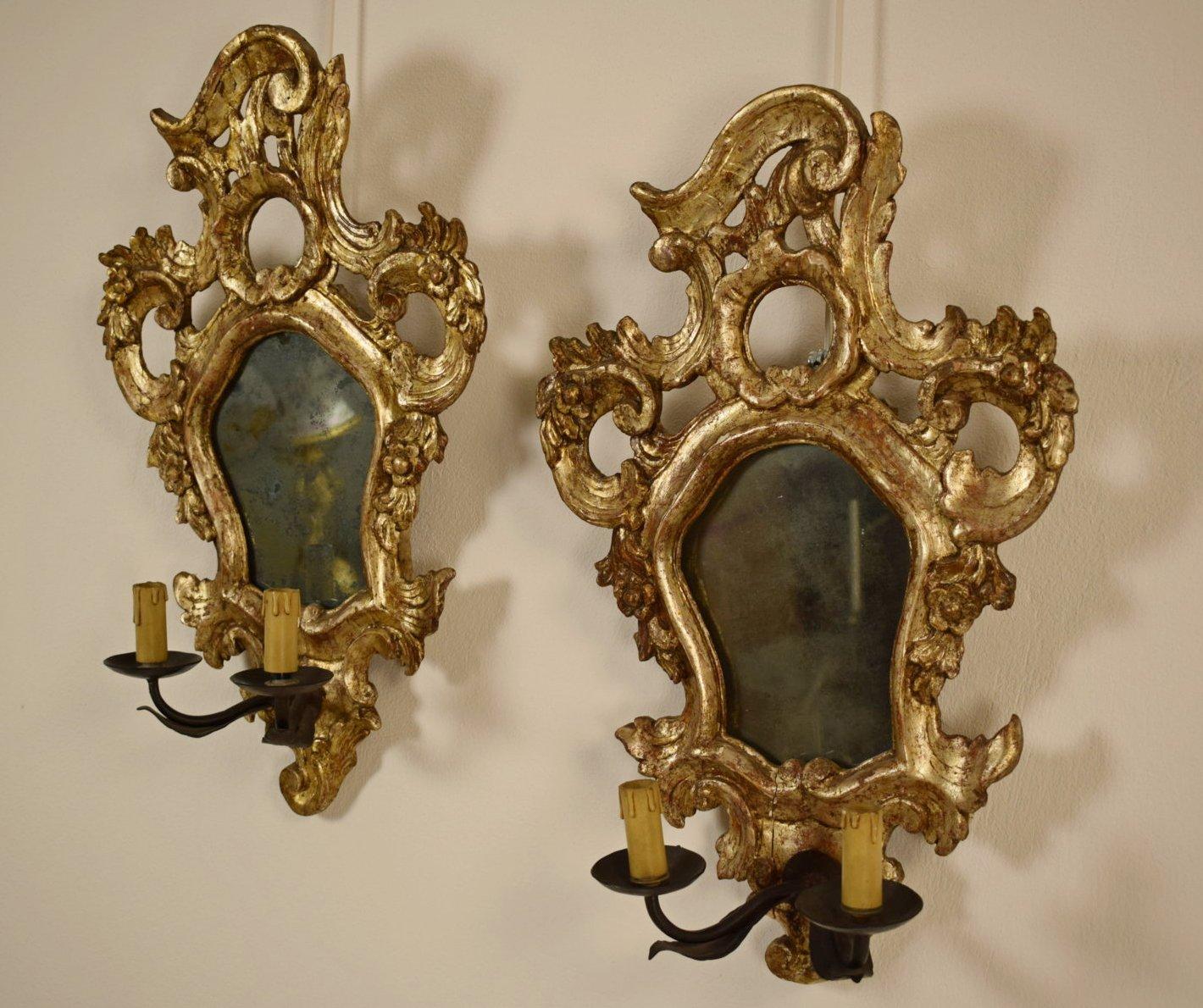 18th century, Mecca giltwood pair of Italian Louis XV candle wall sconce

Pair of Italian candle wall sconce in carved and gilded Mecca wood with mirror.
Louis XV period, mid-18th century

This pair of candle wall sconce, made circa mid-18th