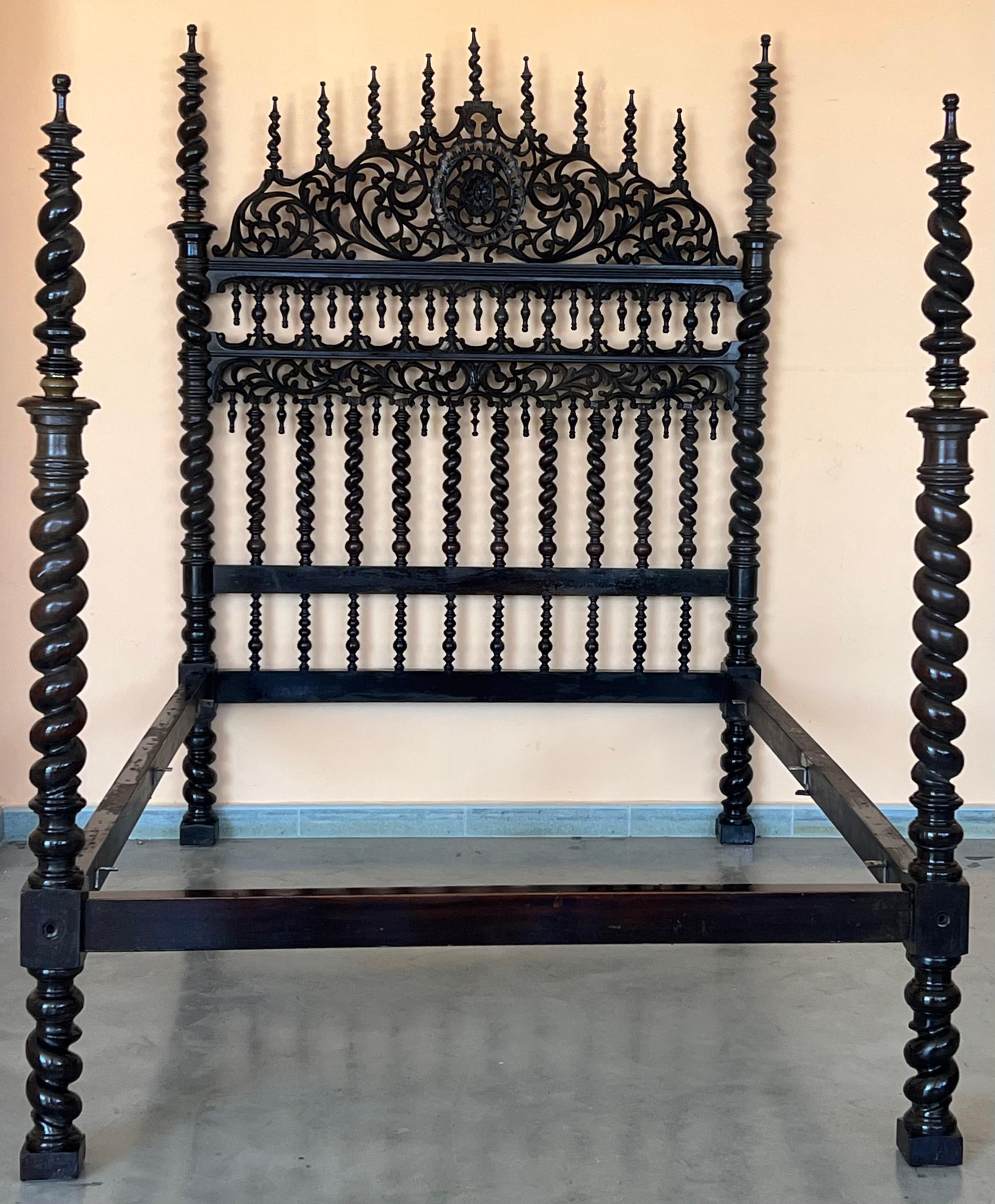 18th century Baroque bed, original Lisbon bed
A Portuguese bed of carved and turned walnut with 17th century elements, the headboard profusely mounted with spiral-twist spindles and the footboard between two boldly turned posts that include