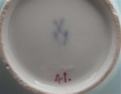 Tetera y tapa botánicas en miniatura de Meissen del siglo XVIII con fondo turquesa