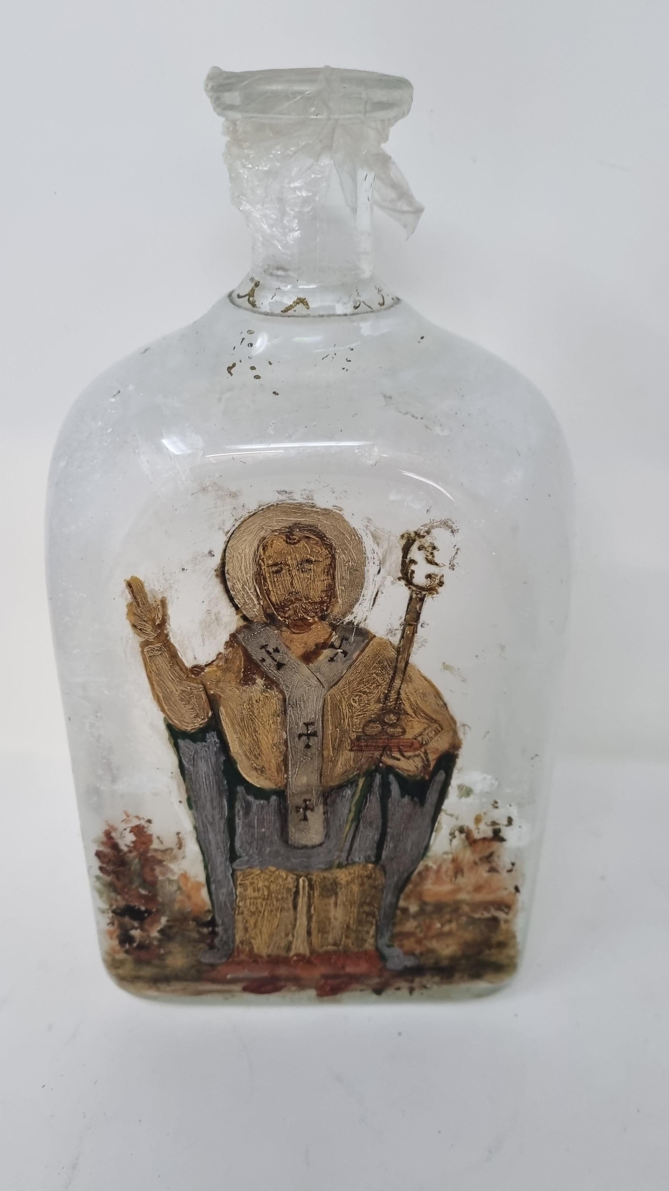 Milky glass bottle with golden decorations. Venice second half of the 18th century.