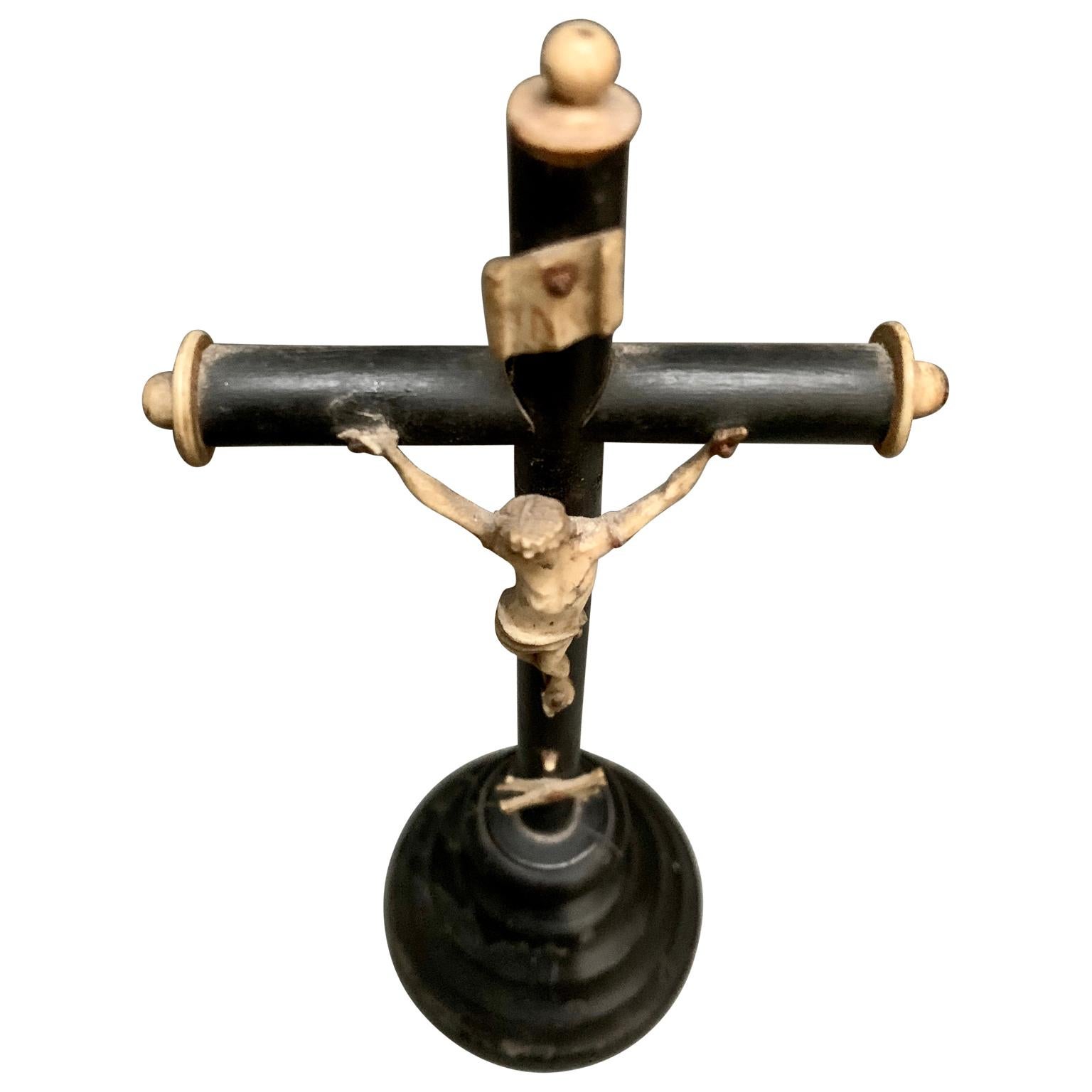 An 18th Century miniature crucifix. The Corpus of Christ is carved in bone. European, found in Belgium.