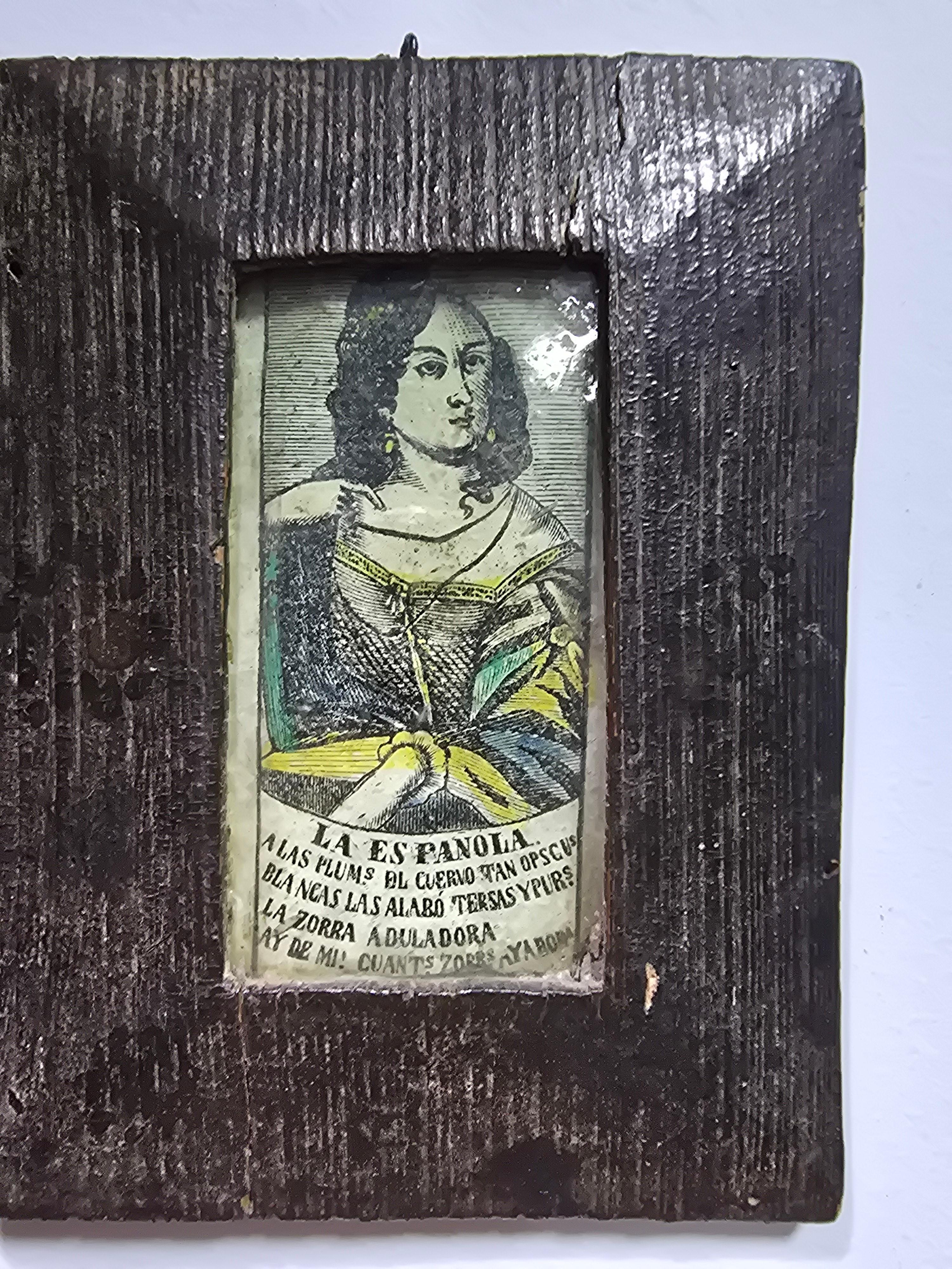 
Grabado antiguo fechado en 1758, enmarcado en su marco de madera original.

Origen: Madrid, España.
Estado de conservación: Bien conservado, con finos detalles.
Marco: Auténtico marco de madera del siglo XVIII.
Dimensiones: Total: 10 x 8 cm 