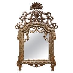 18th century Mirror in carved wood and silver plated wood