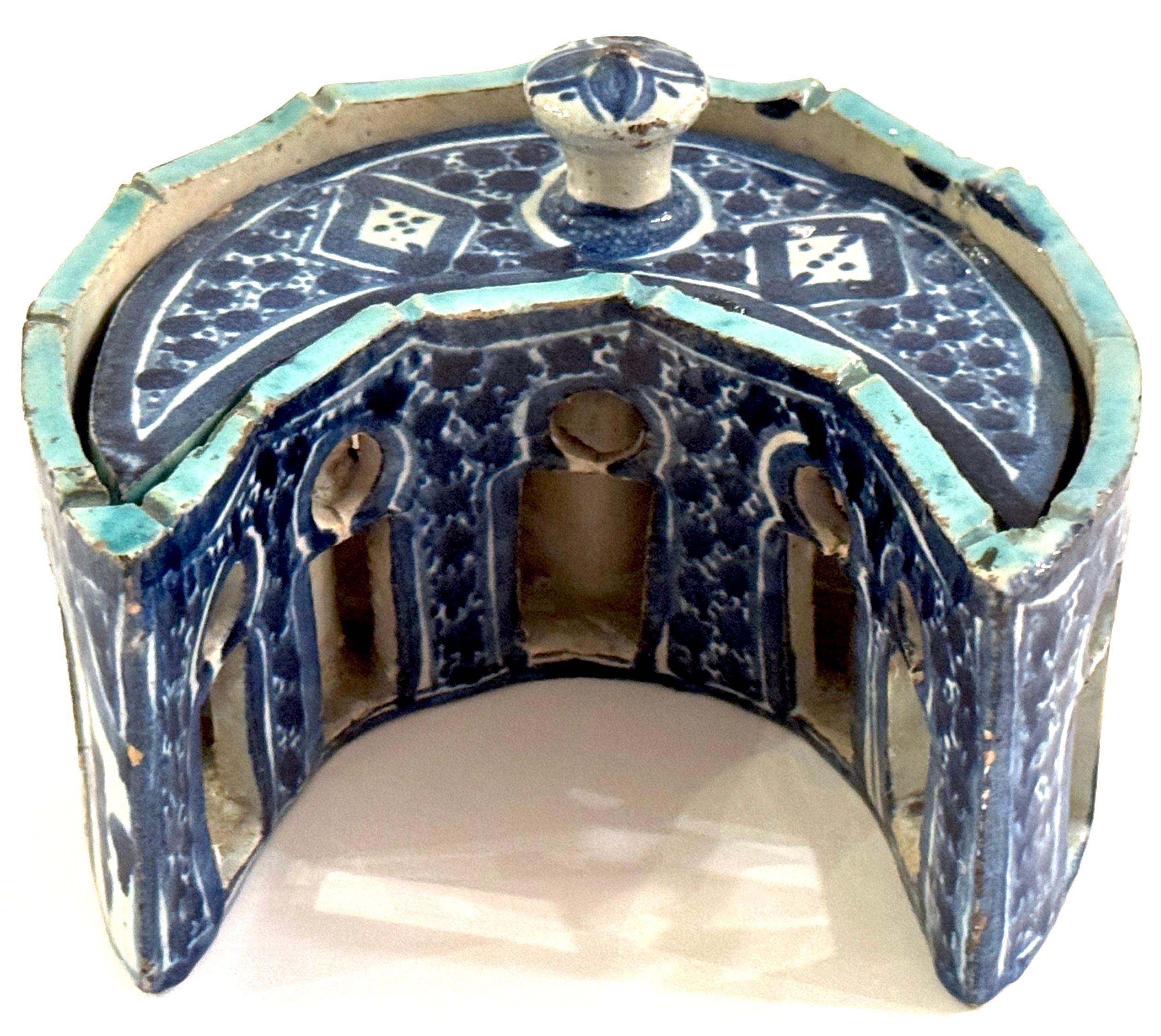 18th Century Moorish-Ottoman Iznik Style Crescent Moon Architectural Inkwell, Signed with Unidentified Cypher Mark

This exquisite 18th-century Moorish-Ottoman architectural inkwell is a remarkable example of Iznik-style artistry and workmanship.