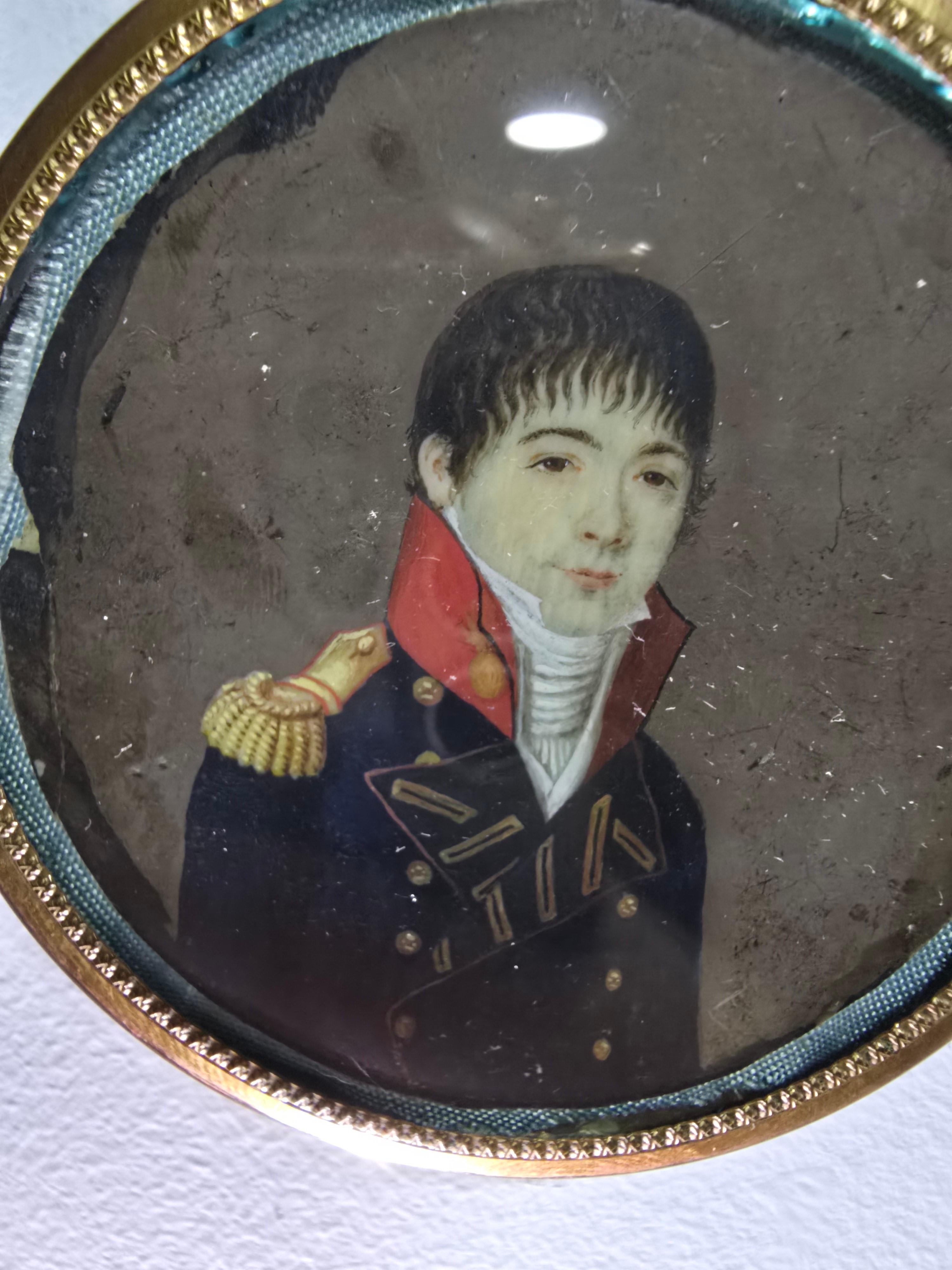 An exquisite 18th-century oil portrait miniature depicting a distinguished naval officer, dressed in period military attire. The artist has meticulously rendered the subject’s uniform and facial expression, reflecting the prestige and authority of