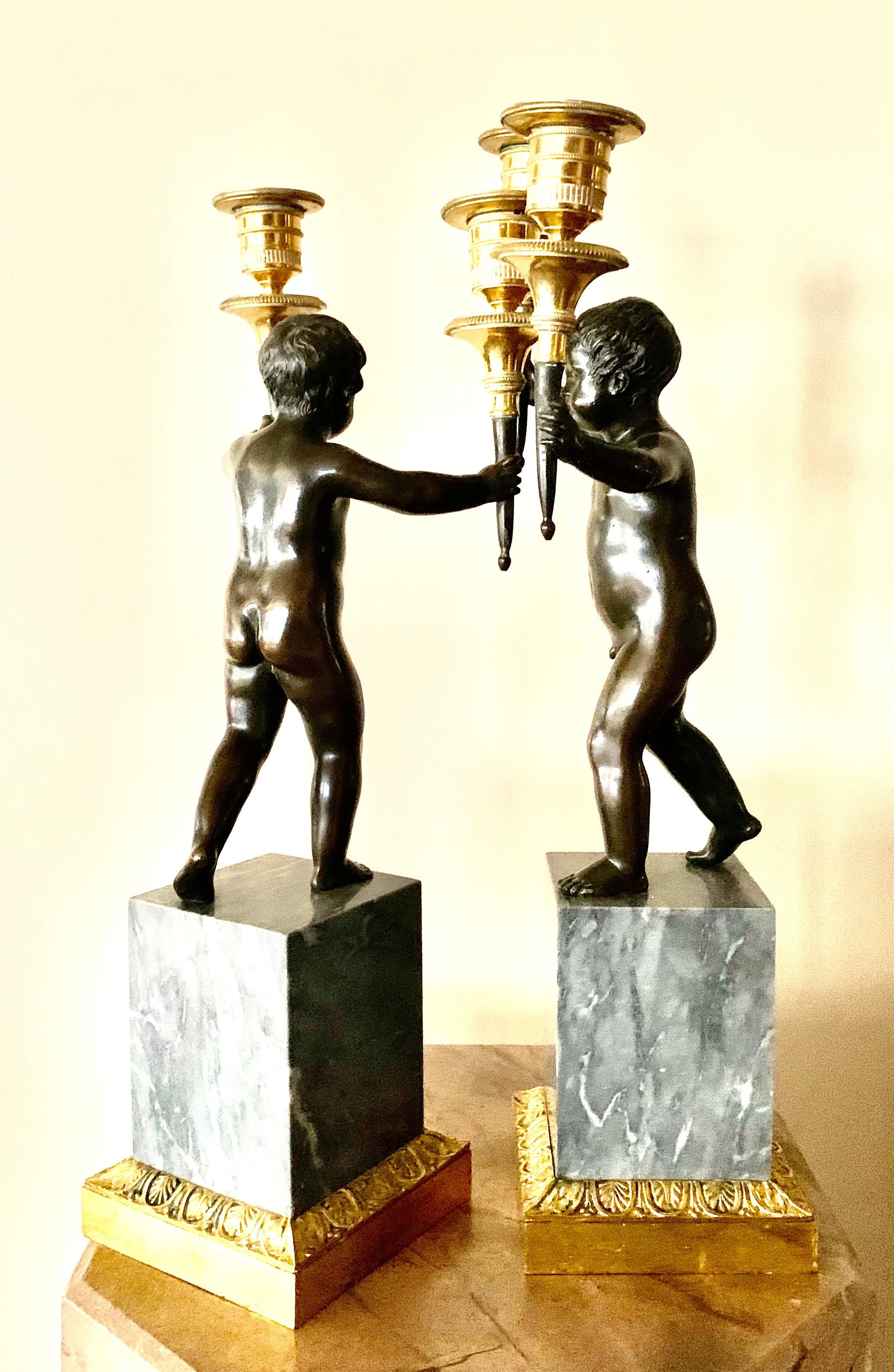 18th Century and Earlier 18th Century Neoclassical Dore and Patinated Bronze Two Light Putti Candelabra For Sale