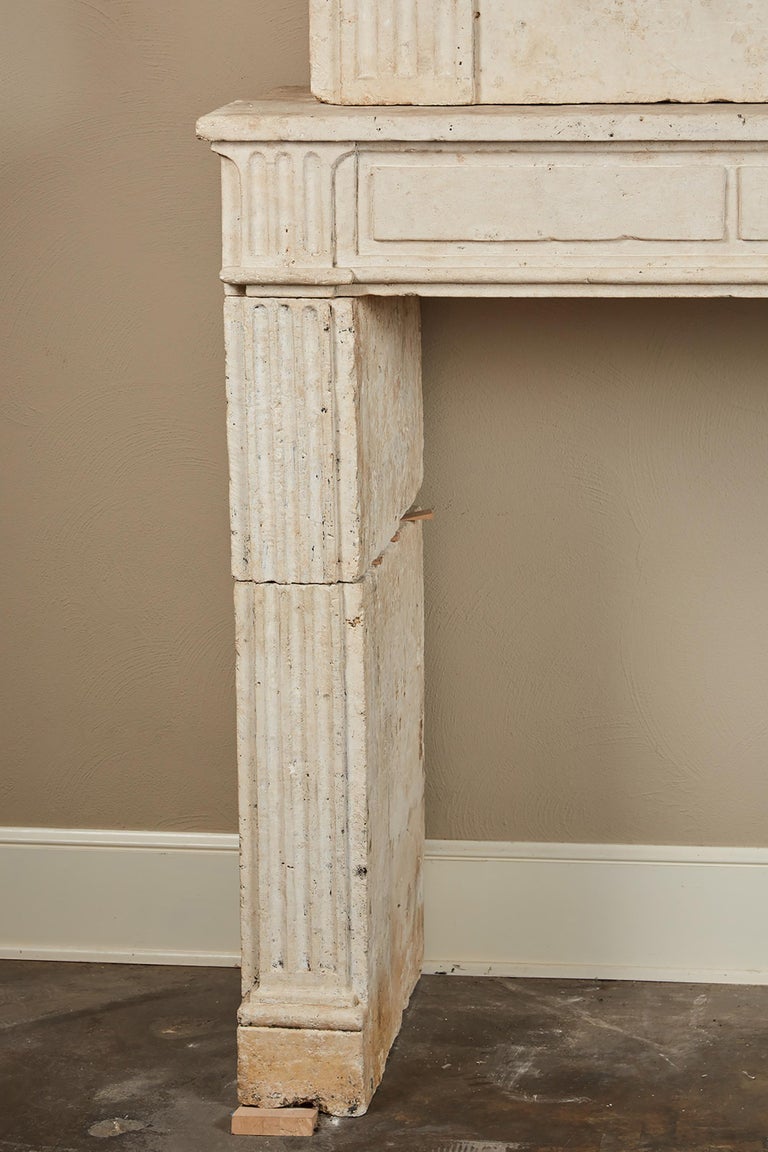 18th Century Neoclassical French Limestone Fireplace Surround In Good Condition For Sale In Pasadena, CA