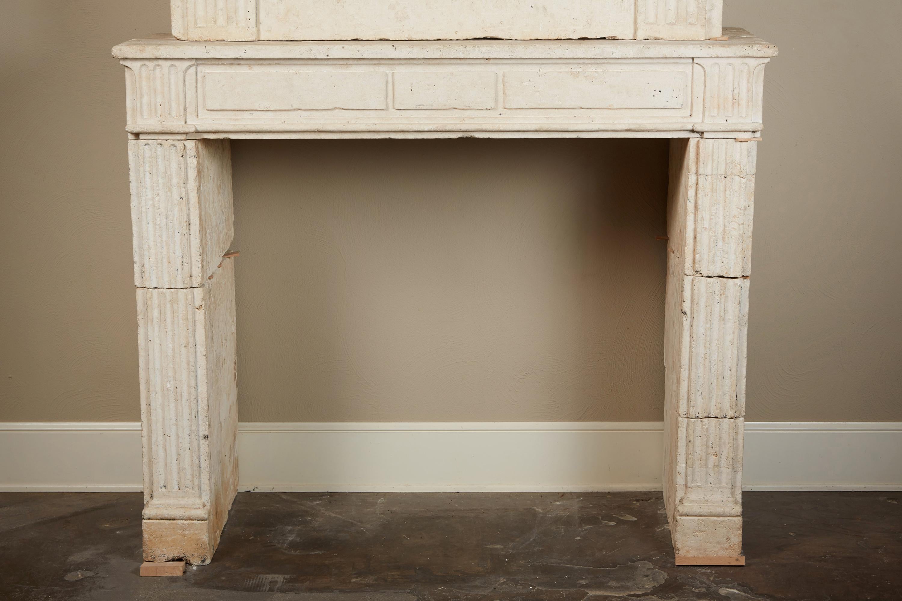 18th Century and Earlier 18th Century Neoclassical French Limestone Fireplace Surround For Sale