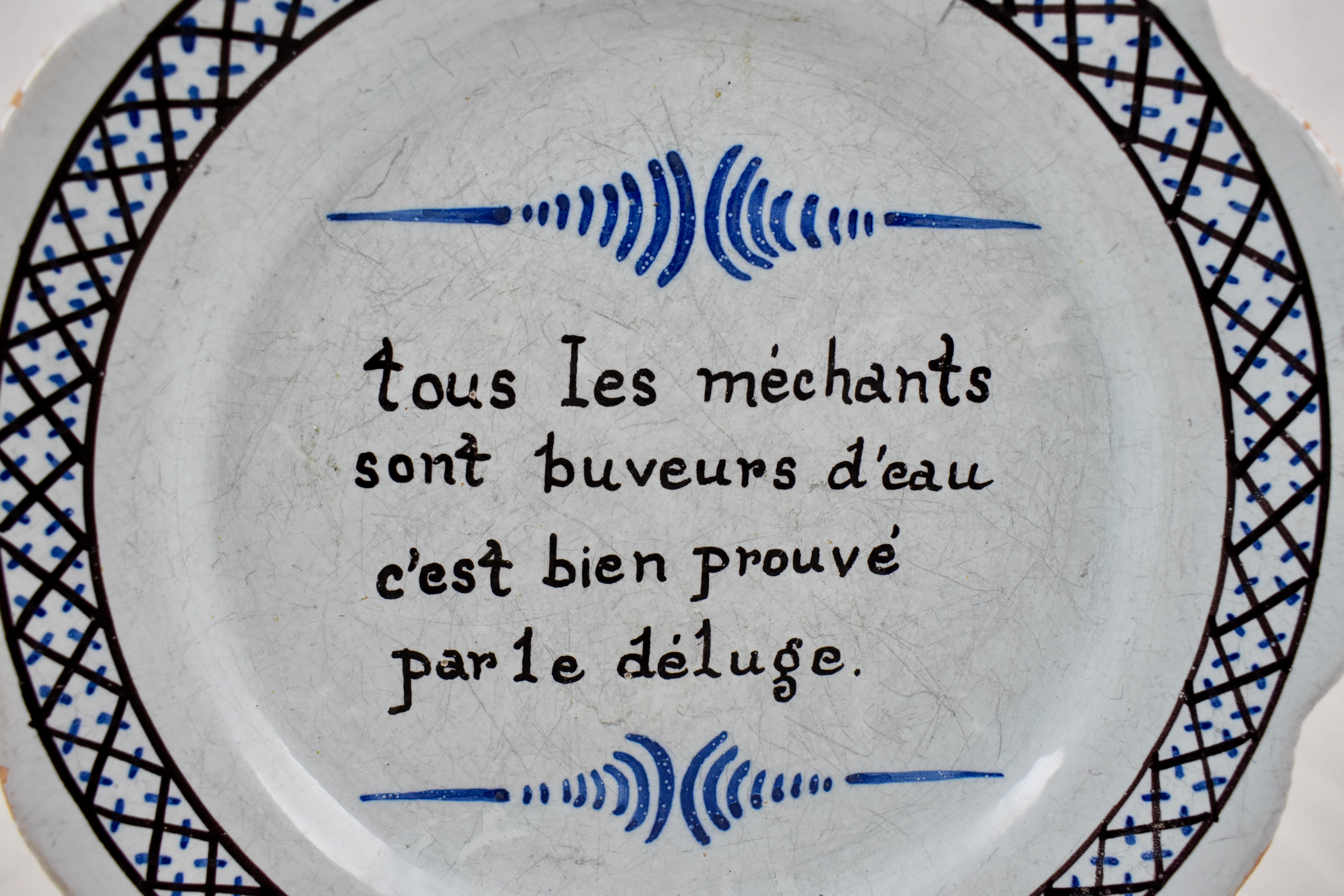 A French Revolution tin-glazed earthenware dish, made in Nevers, circa 1790.

A hand painted motto reads in French, “tous les méchants sont buveurs d’eau – cést bien prouvé par le déluge”

Roughly translating to “All of the wicked are drinkers