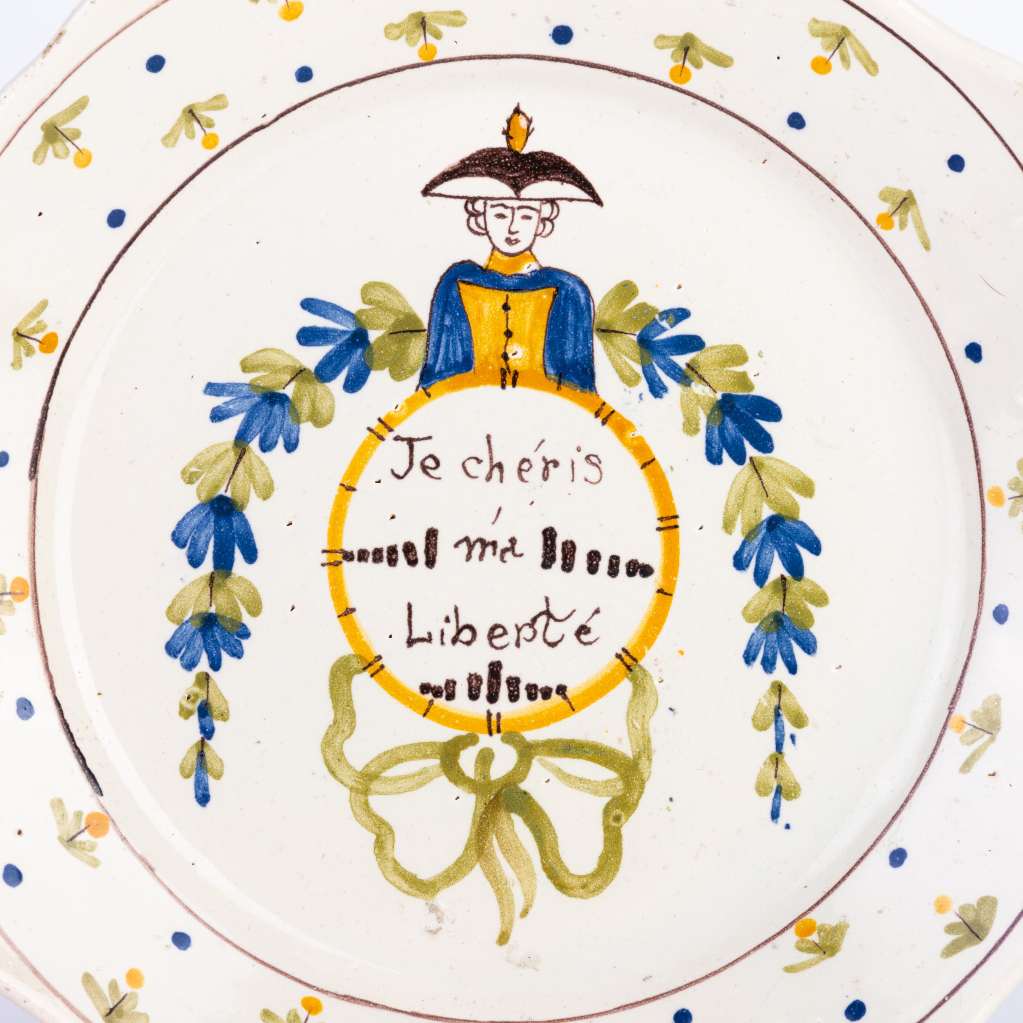 Nevers

Faience earthenware plate with contoured edge with revolutionary polychrome decoration in the center of the inscription 