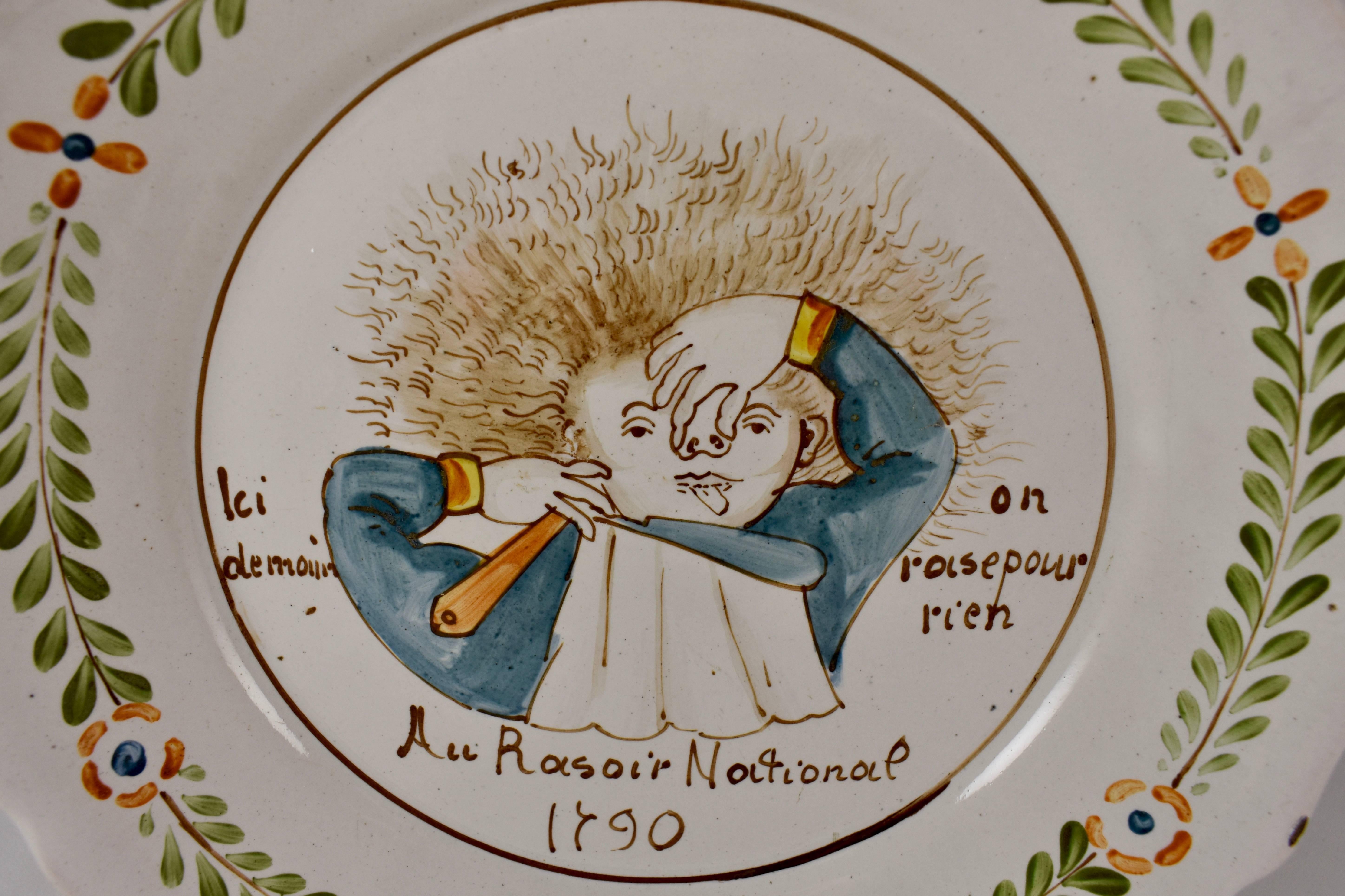 A French Revolution tin-glazed earthenware dish, made in Nevers, circa 1790, called Au Raisoir National or The National Guillotine. The french guillotine is an enduring symbol of the Revolution.

Showing a man pinching his nose, and with a razor