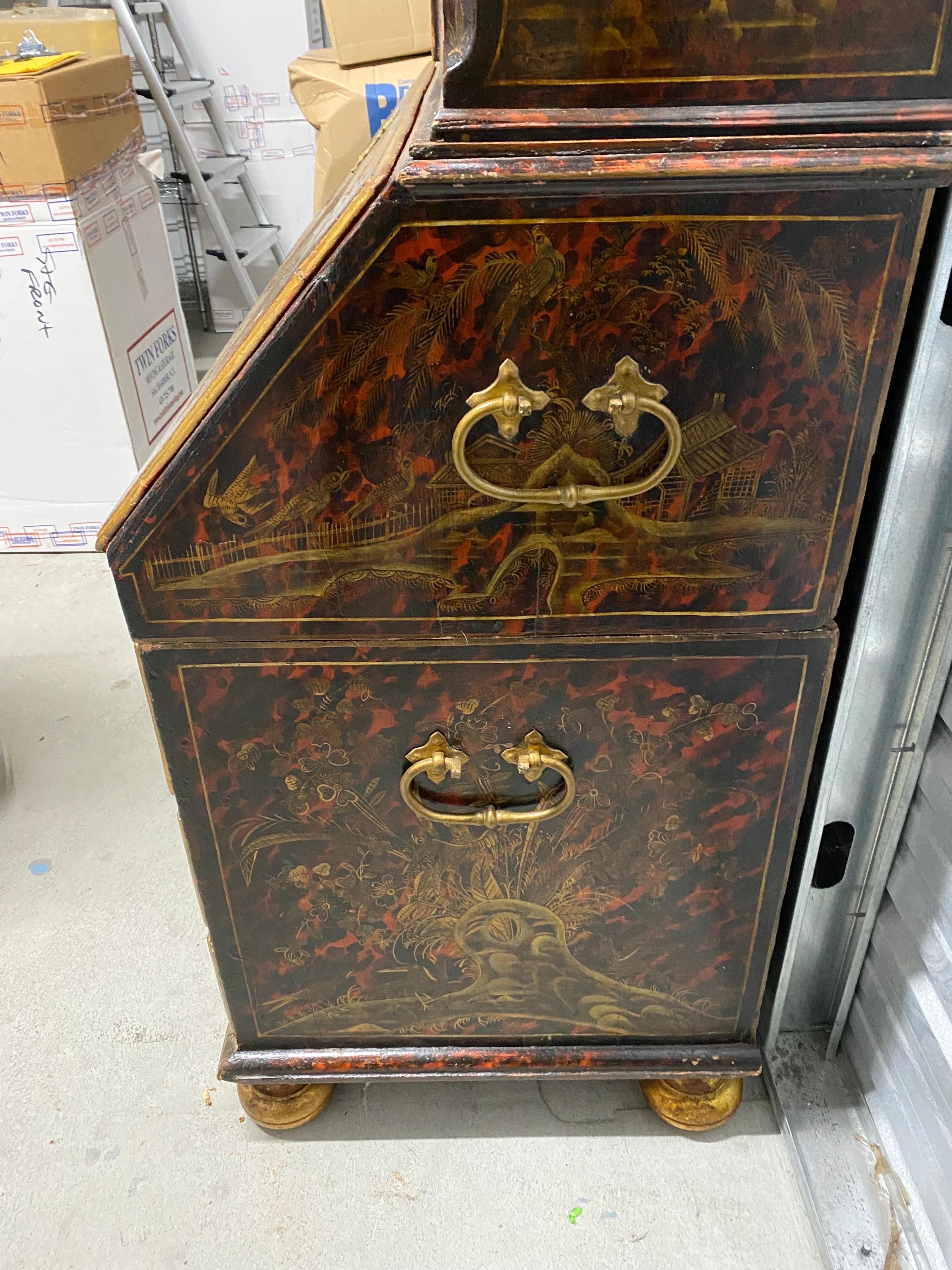 18th Century Northern European Tortoiseshell Lacquer Japanned Bureau Cabinet Secretary

A rare and fine bureau cabinet. Three sections: a broken pediment crown atop a tall cabinet with 2 shelves (included but not shown in photo) and two drawers.