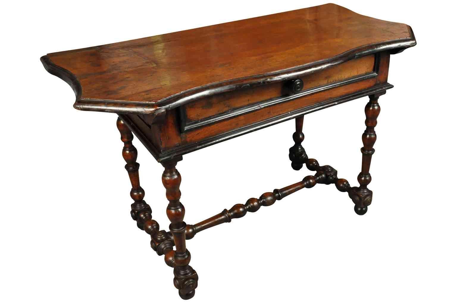 A very handsome 18th century console from Northern Italy. Beautifully constructed in walnut with ebonized detailing and elegant inlay. The tone and patina are outstanding. Perfect not only as a console, but serves wonderfully as an end table or sofa