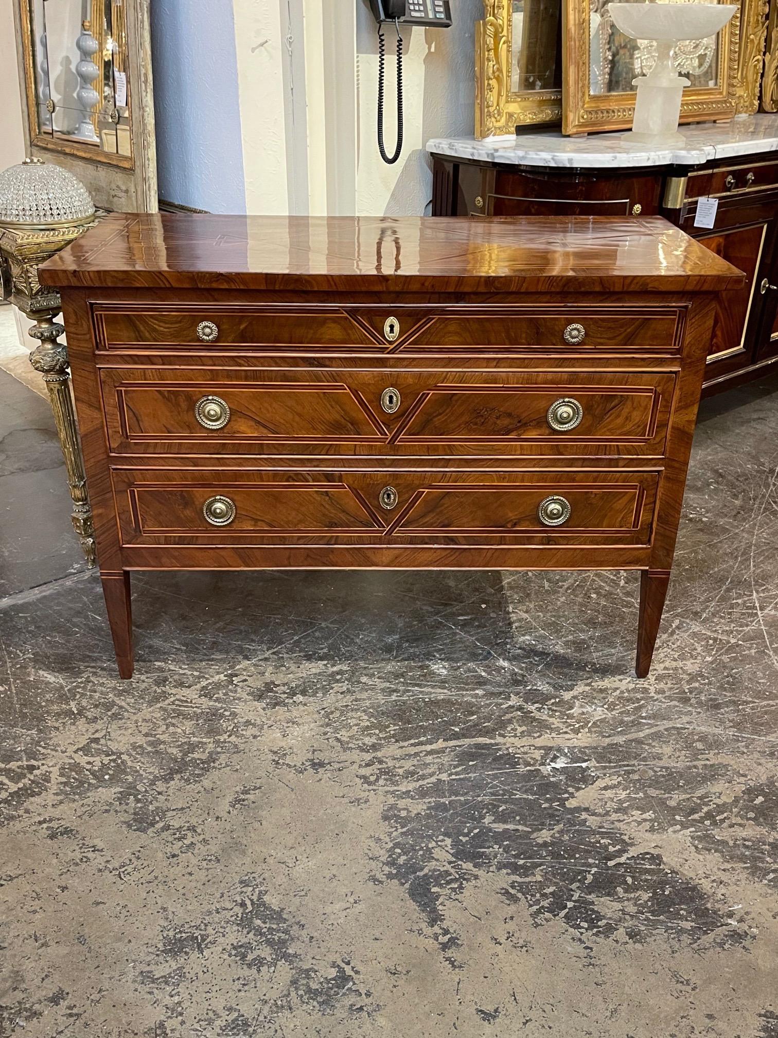 Gorgeous 18th century Northern Italian rosewood commode. Very fine finish and beautiful inlaid pattern. Extremely elegant for a fine home!