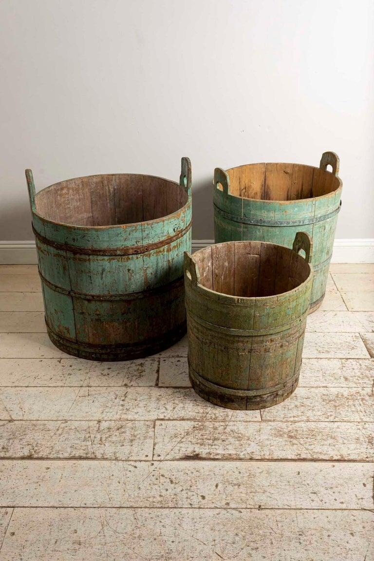 18th century Swedish rustic barrel from the North of Sweden.
Set of (3) - LARGE VERSION ONLY
Extremely rare and their color is absolutely gorgeous.

Measures: Large barrel 70 cm wide x 78 cm height 

Large- diameter.  26” inches 
            Height.