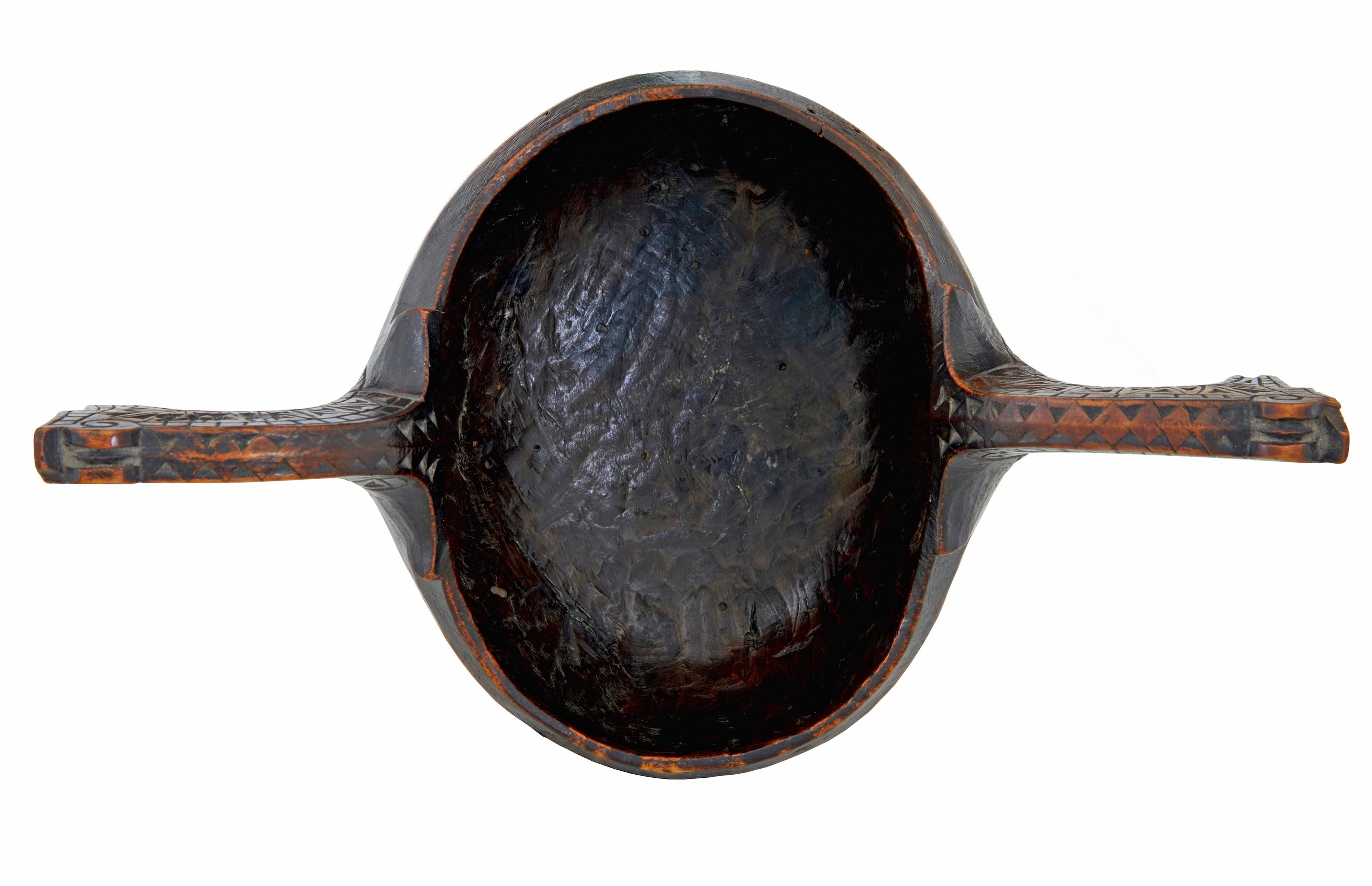 Good quality Norwegian horse head ale bowl known as a kasa/kuksa.

Dated on the base 1773, with makers marks.

Hand carved decoration, with original polychrome paint.

Evidence of old inactive worm.