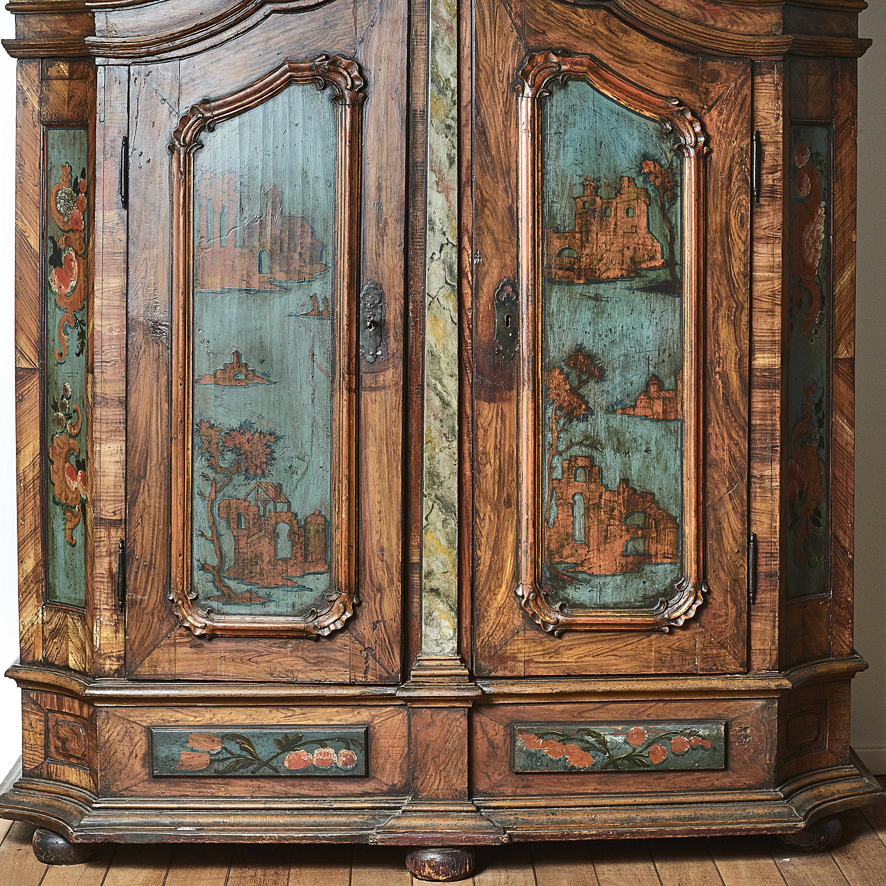 18th century Norwegian rococo cabinet with a large decorative pediment, original painted and decorated in polychrome color.
A fantastic and richly carved cabinet flanked by concave panels. 100% original condition.
Untouched in mint condition.
 