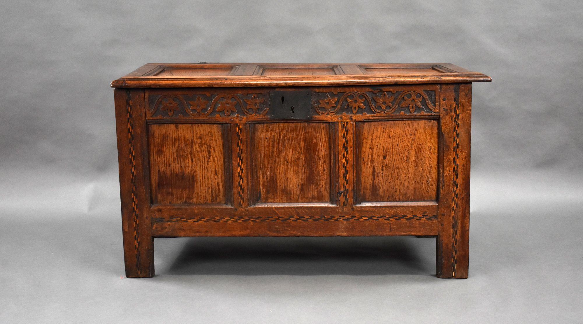For sale is a good quality 18th century oak coffer, having a hinged and paneled lid, above a paneled front, standing on square feet, this piece remains in very good condition for its age.

Width: 107cm Depth: 52cm Height: 60cm