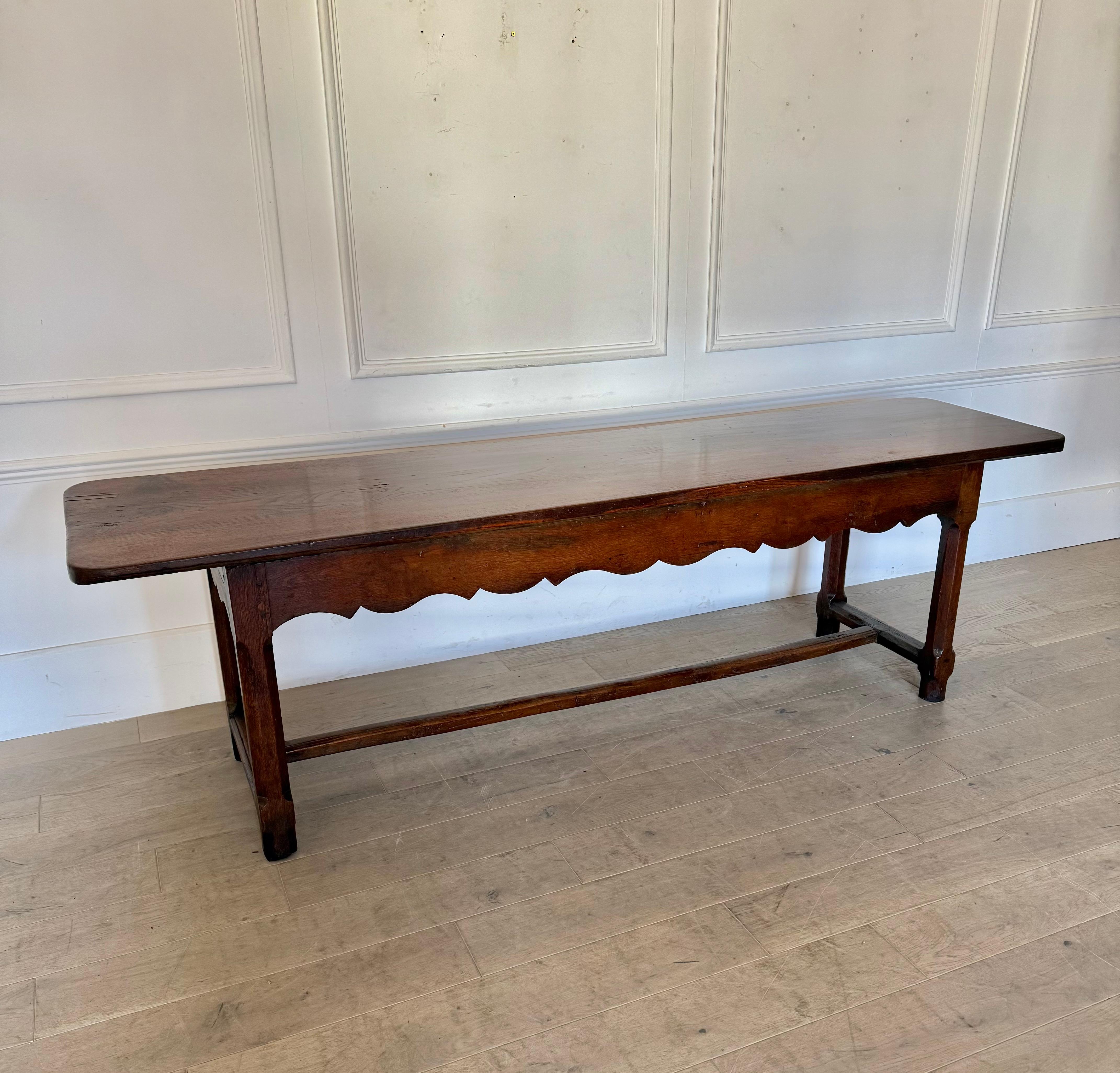 Great example of a late 18th Century solid oak serving table or console table.
French, circa 1780’s.
Single planked top , lots of character and charm 
With a large single drawer to one end (a later replacement) with a hand forged handle. 
This table