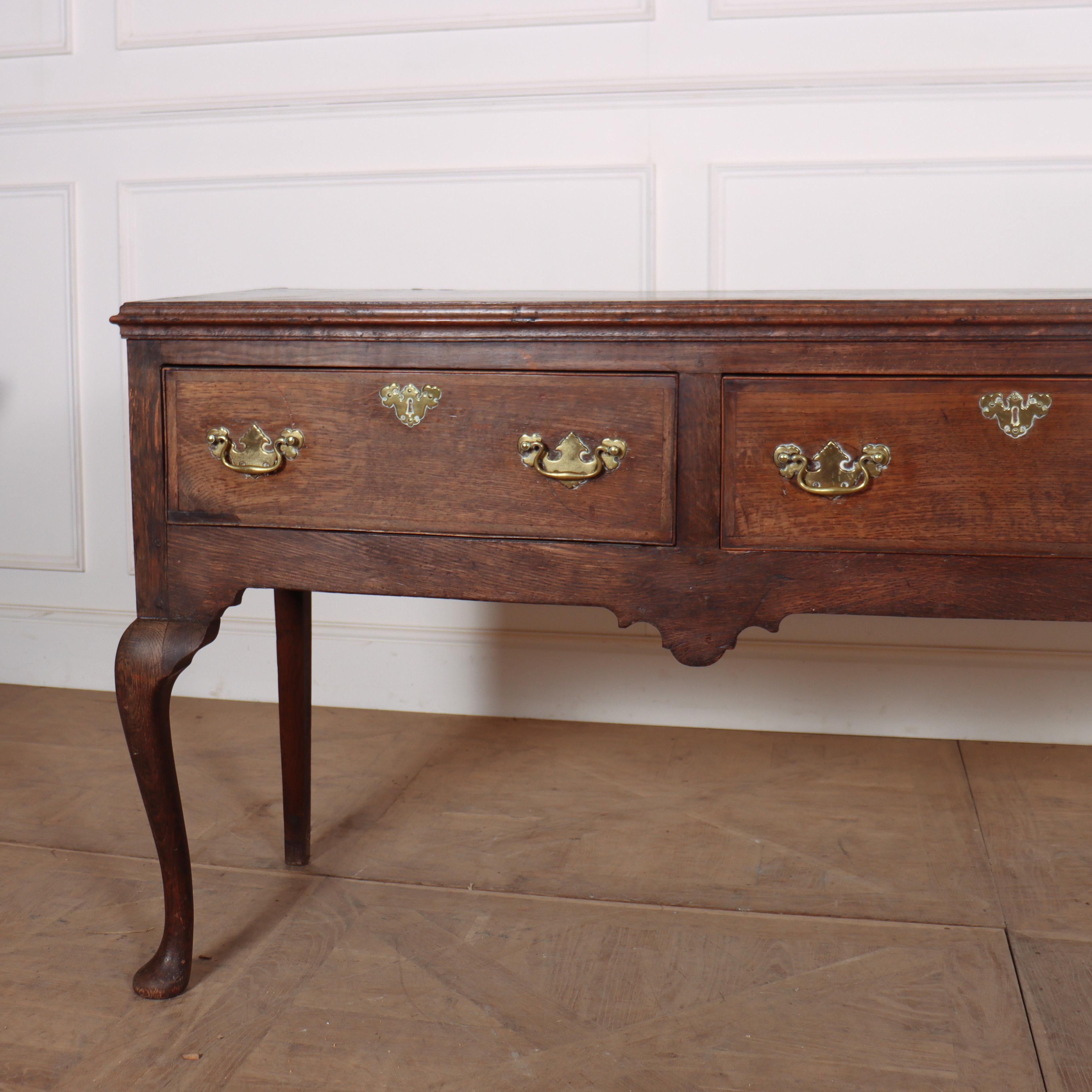 18th C English three drawer oak dresser base with mahogany crossbanding. 1780

Reference: 7981

Dimensions
74.5 inches (189 cms) Wide
21 inches (53 cms) Deep
32 inches (81 cms) High