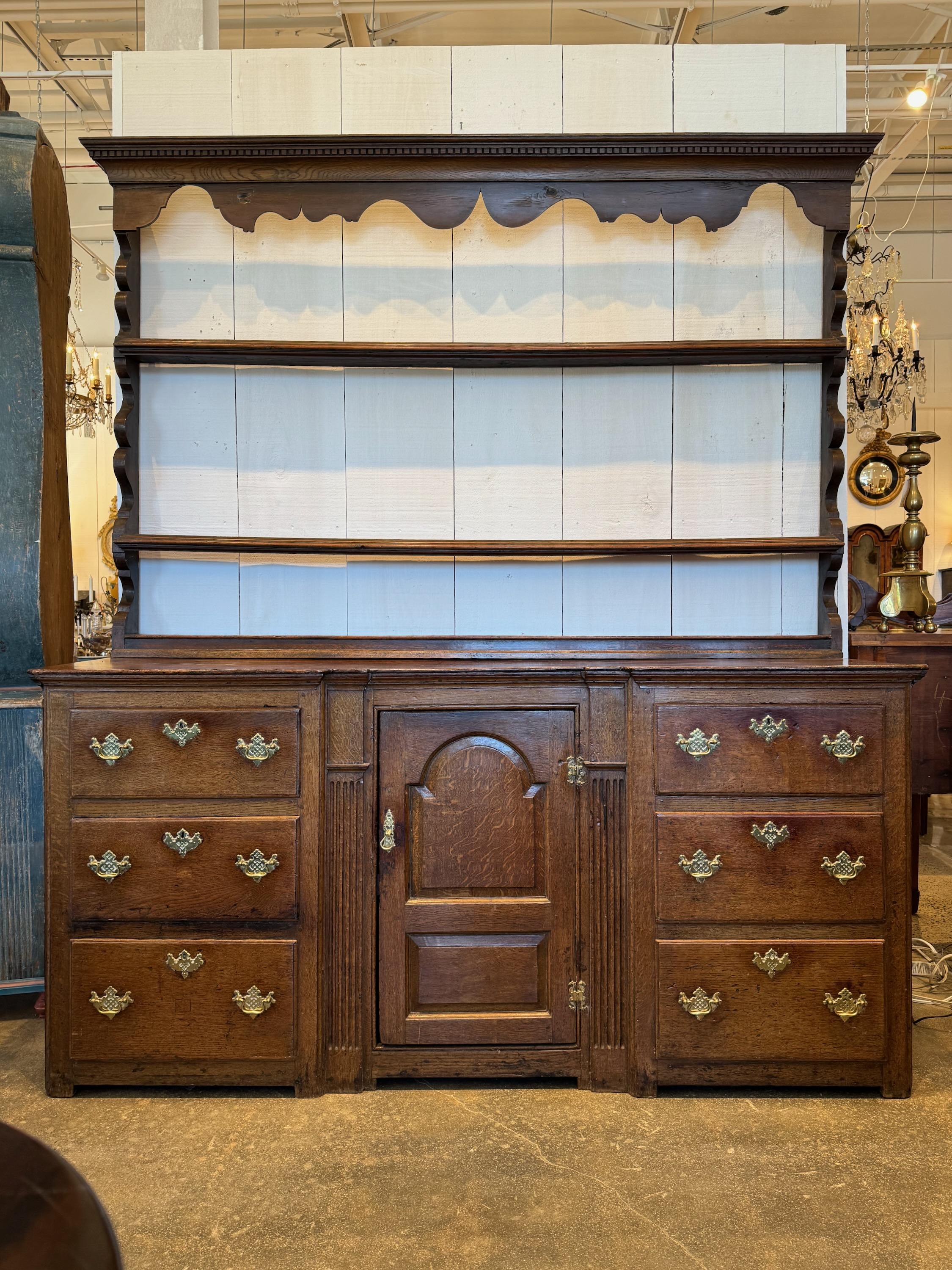 A handsome Welsh dresser with plate rack. Lots of storage room.