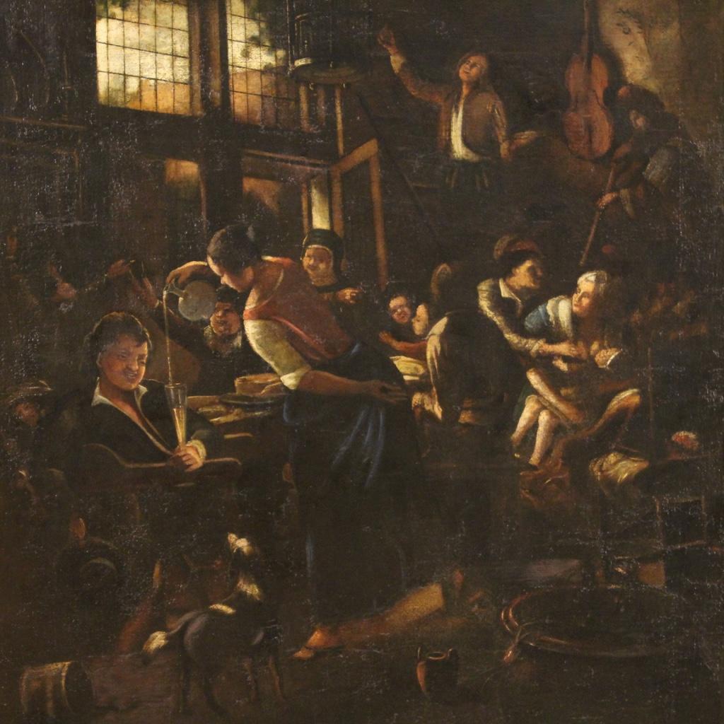 Antique flemish painting from the 18th century. Framework oil on canvas depicting the interior of a tavern with characters of good pictorial quality. Wooden frame of the twentieth century adorned on the front by applied, carved and gilded wooden
