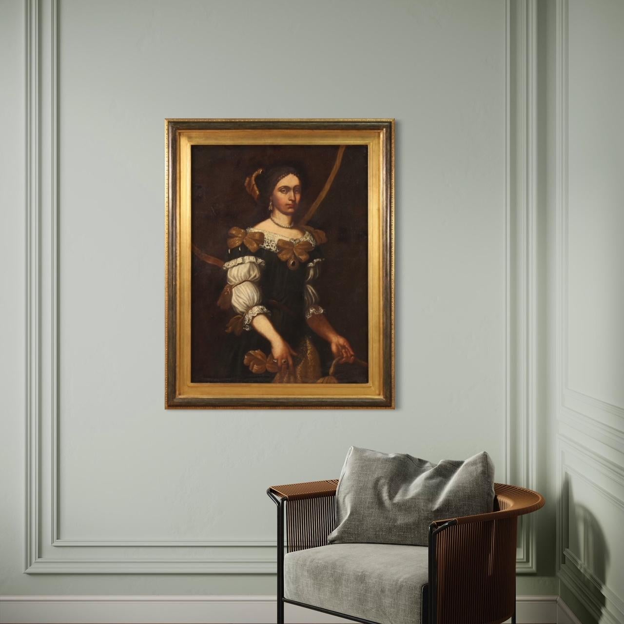Ancient Italian painting from the first half of the 18th century. Oil on canvas artwork depicting a female portrait, young noblewoman in sumptuous dress, of good pictorial quality. Painting of great size and impact adorned with a modern carved,