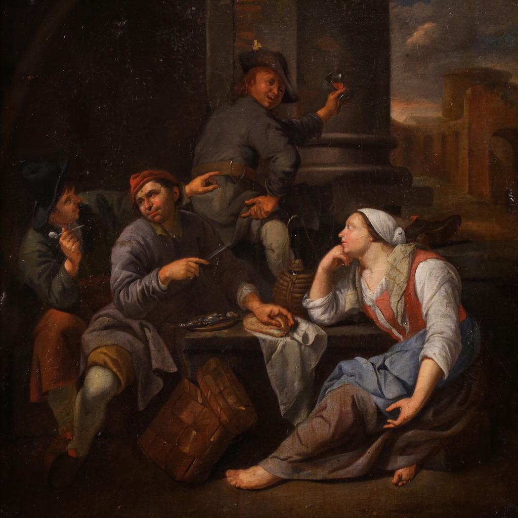 Refined Flemish painting from the 18th century. Oil on canvas artwork depicting a lively genre scene, of notable pictorial quality and rich in minute details. In a rustic setting, probably outside an inn, some popular figures are carefreely