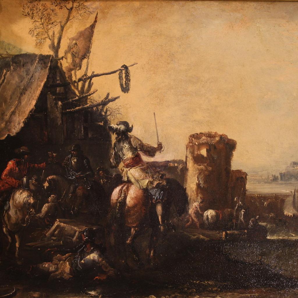 Peinture italienne ancienne de la première moitié du XVIIIe siècle. Huile sur toile représentant un splendide paysage côtier avec des chevaliers et des soldats. La peinture allie le dynamisme typique des batailles à un arrière-plan imposant de