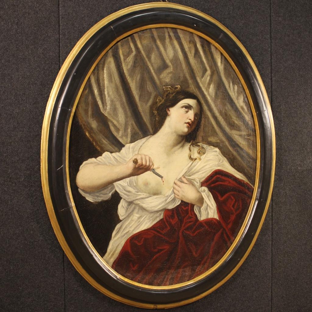 Antique oval painting from 18th century. Italian framework oil on canvas depicting the suicide of Lucretia in the act of piercing her chest with the dagger, after being forced to yield to the requests of the son of Tarquinio the Superb. Her husband