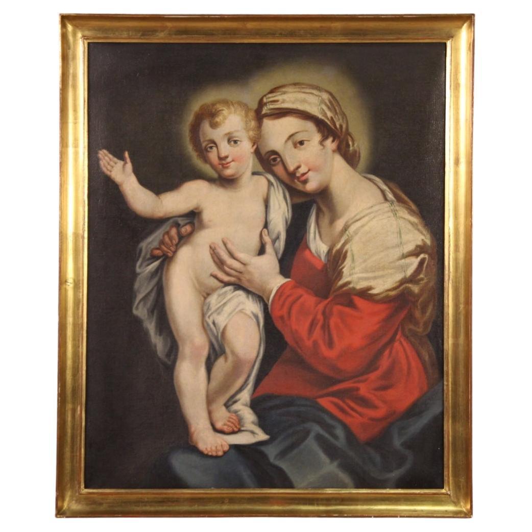 Antique Italian painting from the 18th century. Artwork oil on canvas depicting a religious subject Madonna with child of good pictorial quality. Painting of beautiful size and excellent proportion adorned with a non-coeval wooden frame, from the