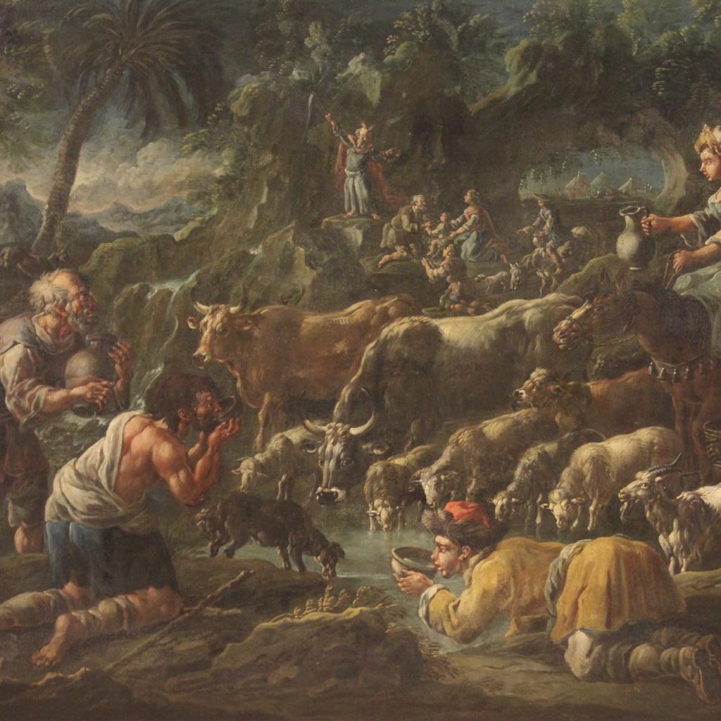 Italian school of the first half of the 18th century. Oil on canvas artwork of considerable size and excellent pictorial quality depicting a splendid landscape with a biblical scene in the background, Moses Striking the Rock. Painting attributable