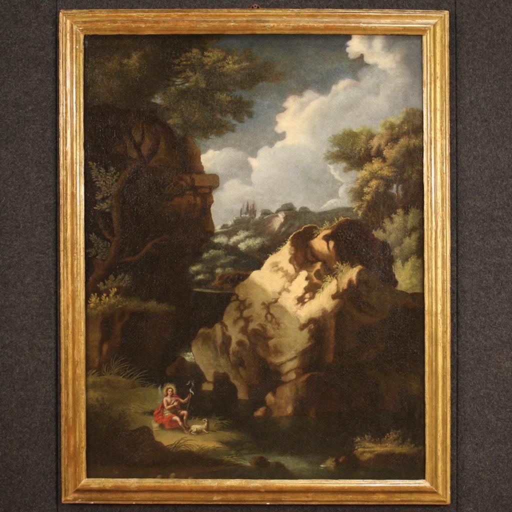 Antique Italian painting from the first half of the 18th century. Work oil on canvas depicting a wooded landscape with St. John the Baptist and a lamb of good pictorial quality. Beautifully sized and pleasantly decorated painting, of good