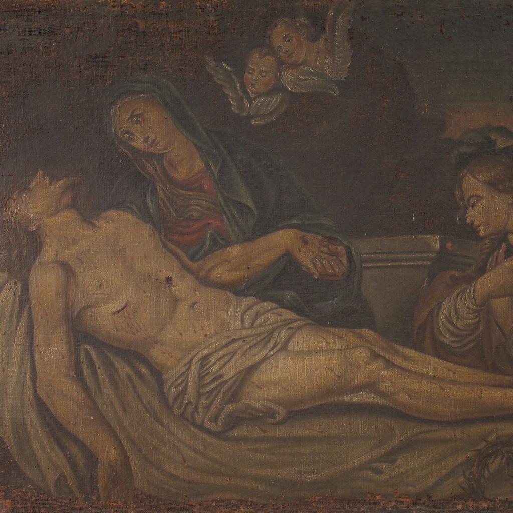 Antique Italian painting from the 18th century. Artwork oil on canvas, on the first canvas, depicting a religious subject Lamentation over the Dead Christ of good pictorial quality. Painting that develops horizontally, of good size and proportion,