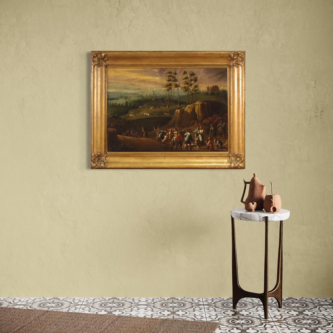 Antique Italian painting from the 18th century. Artwork oil on canvas depicting landscape with pilgrims of a religious nature, scene under study, of good pictorial quality. Beautifully sized artwork adorned with a 20th century frame, sculpted and