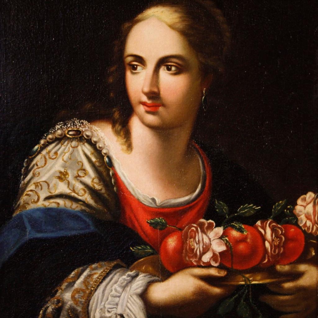 Antique Italian painting (Florentine school) from the mid-18th century. Oil painting on canvas depicting a portrait of a young lady with fruit, of excellent pictorial quality. Modern wooden frame of beautiful decoration, carved and gilded. Framework